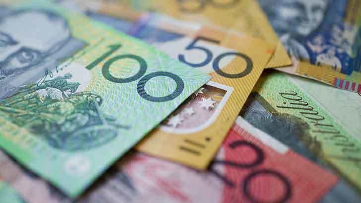 Australian banknotes including $100, $50, and $20 notes spread out, symbolizing transparent pricing and plumbing service costs from Fix-It Right Plumbing