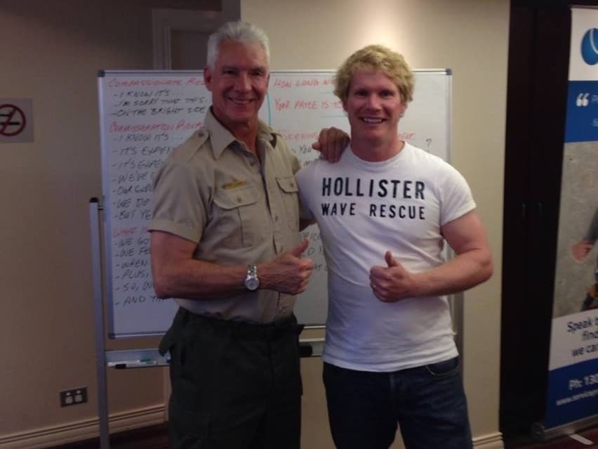Richie with his trainer Charlie after graduating from Charlie's training class in 2013.