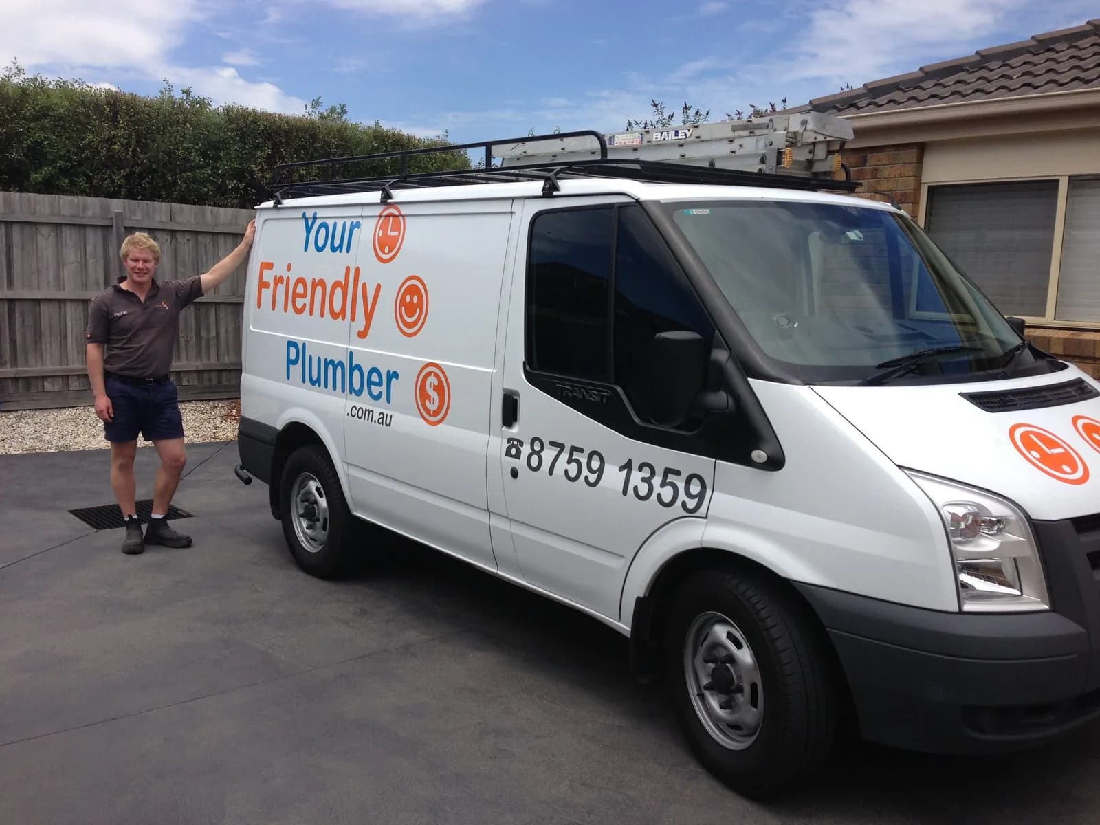 Richie Foster beside the Your Friendly Plumber van, the second name the business traded under