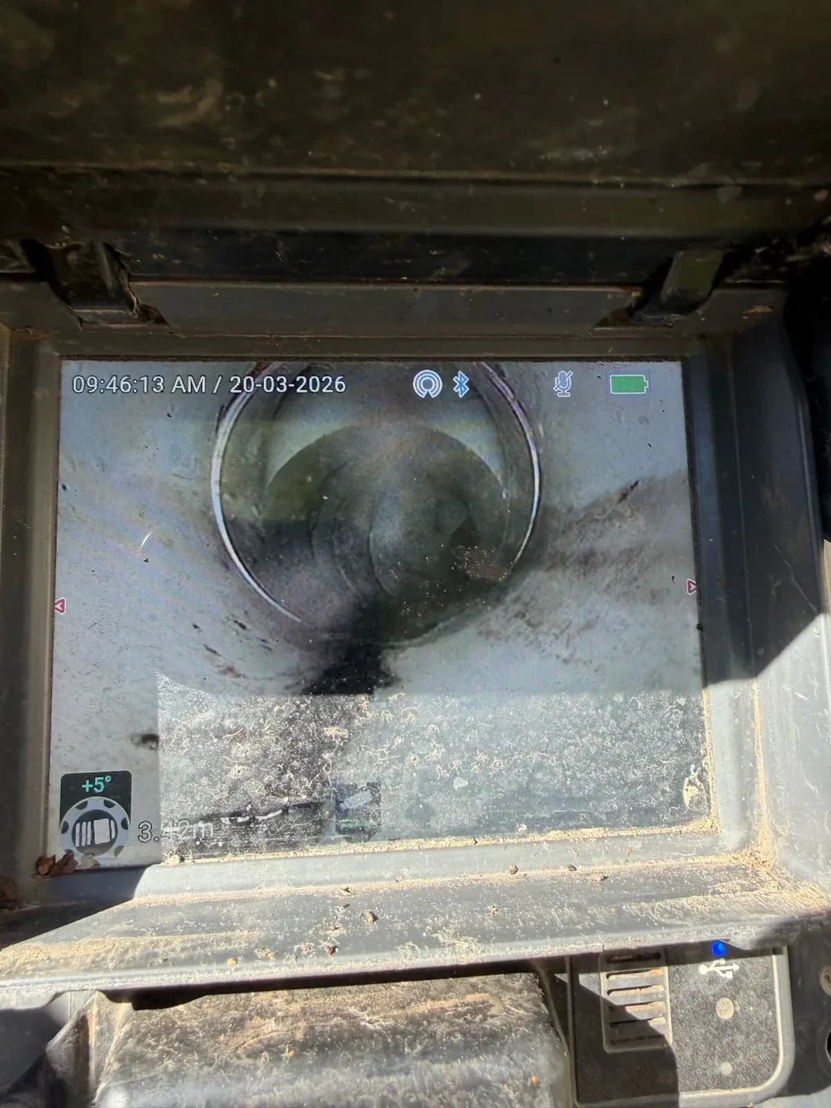 Drain camera view of the sewer pipe after jetting