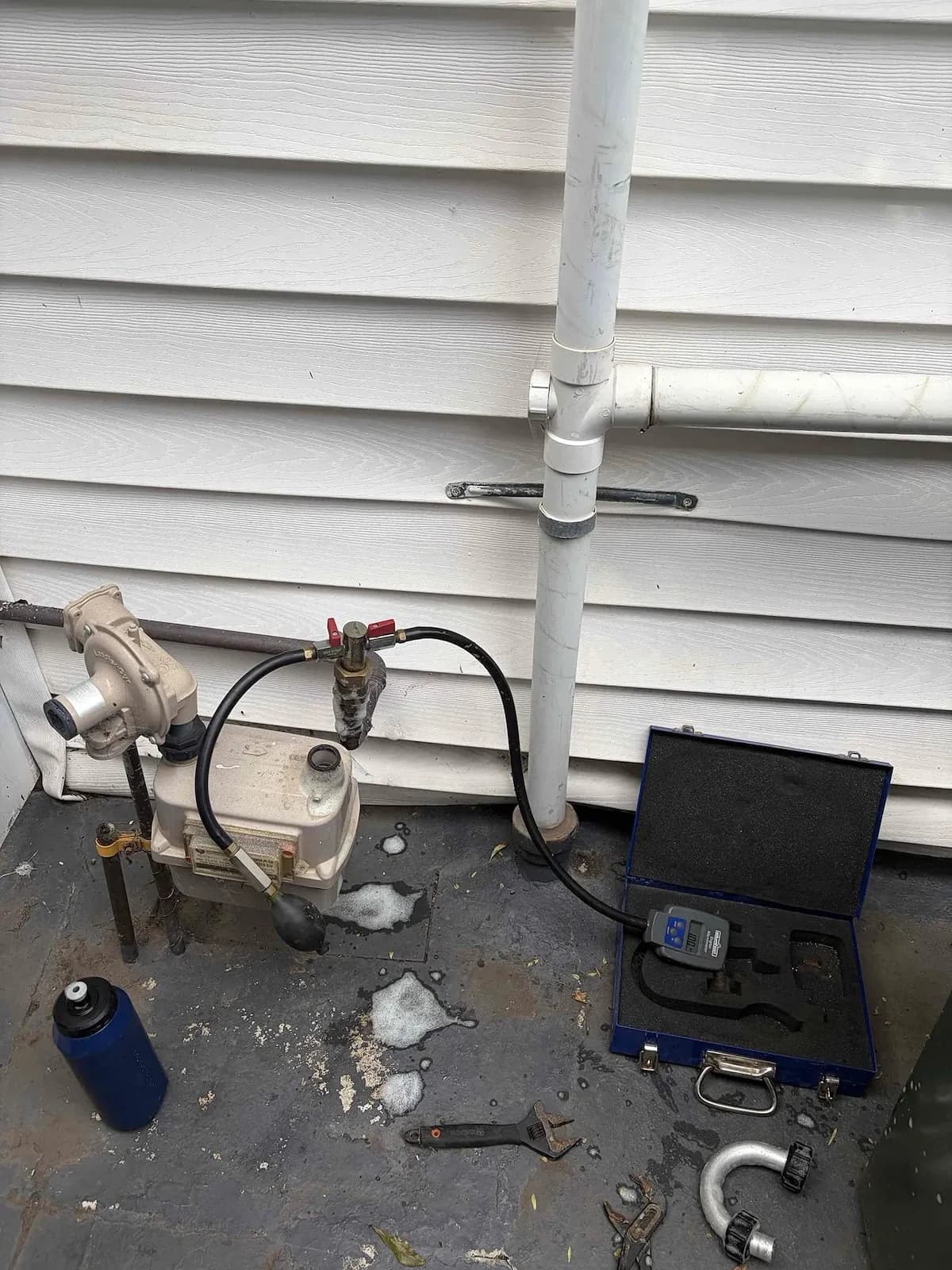 Gas test gauge set up beside the hot water units