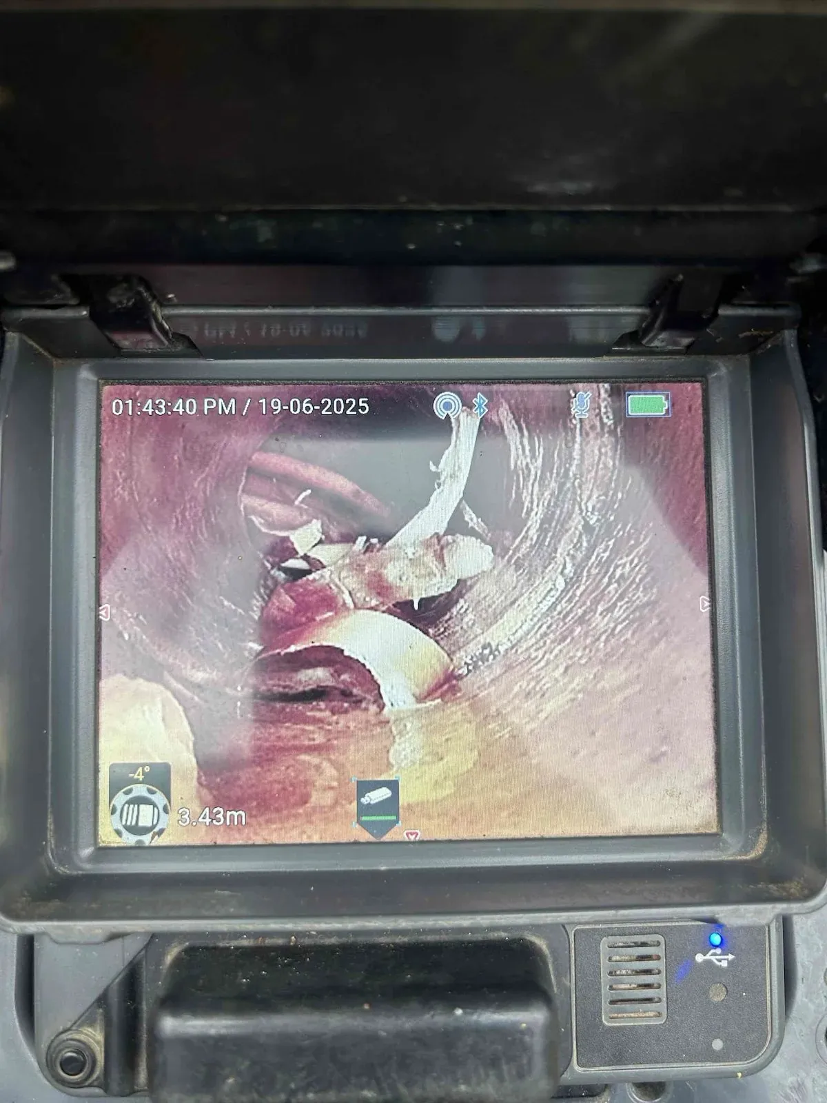 Drain camera showing the blockage in the pipe