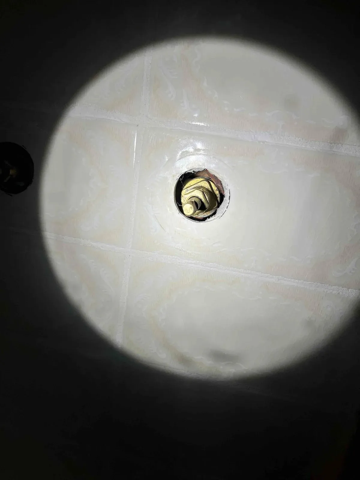 Shower tap spindle exposed for testing