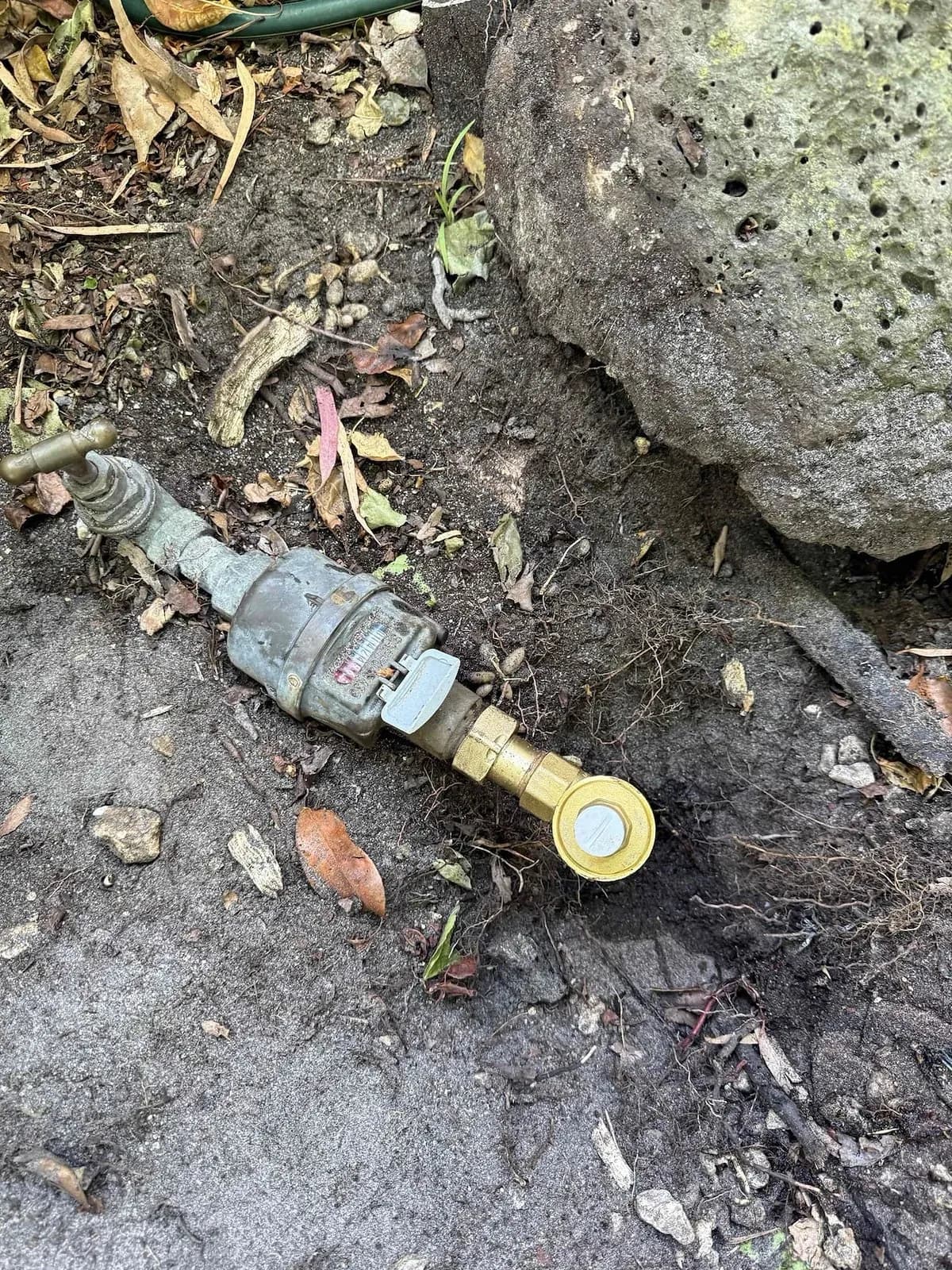 Water meter and pipework in the front garden