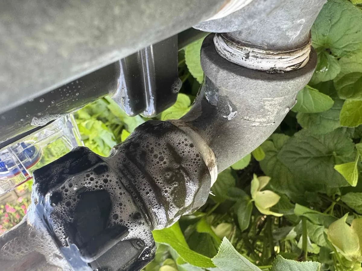 Leak detection spray on the gas meter fittings