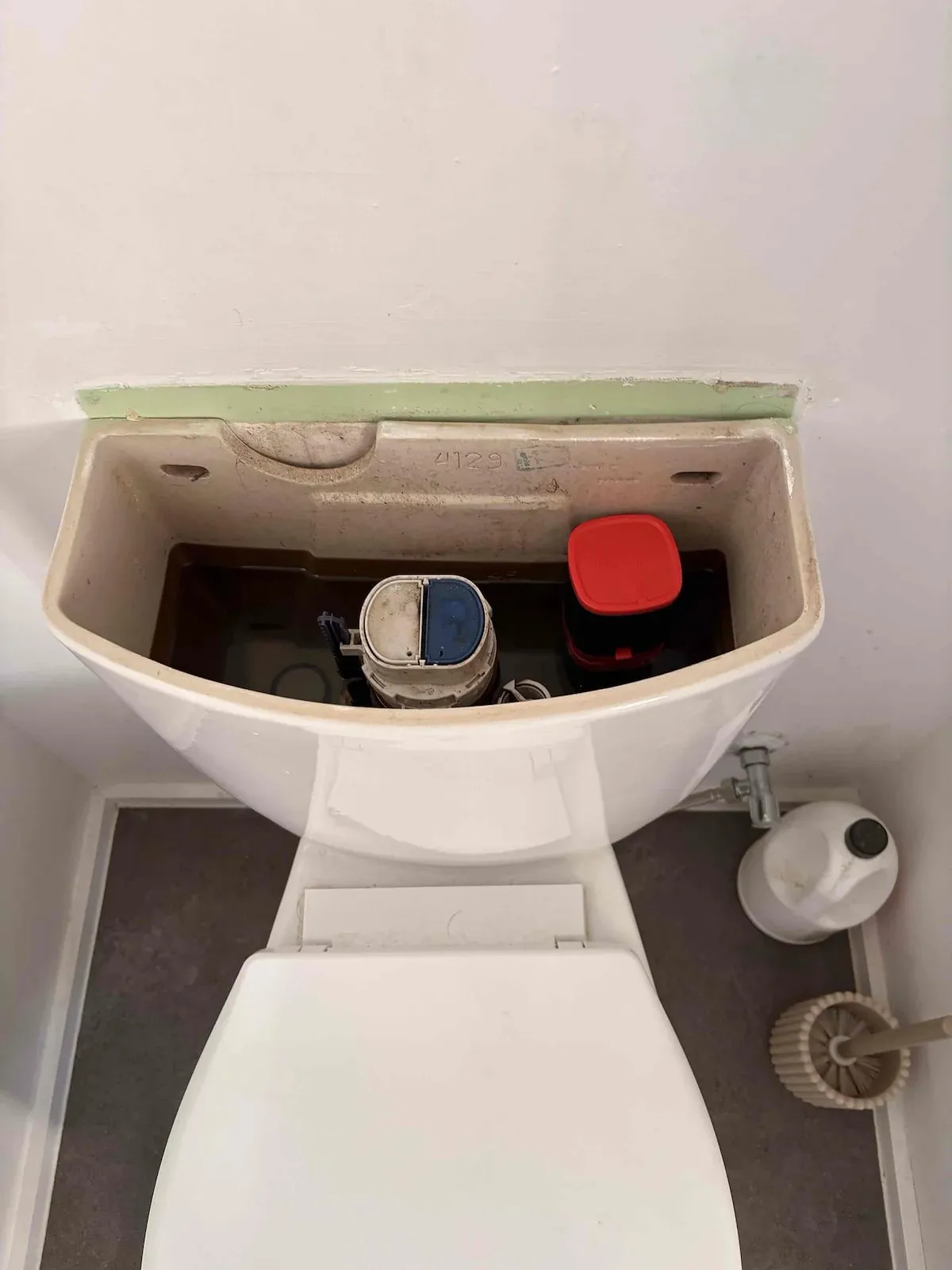 Cistern opened up to fix the leak