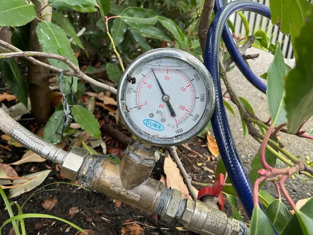 Pressure gauge testing the water line