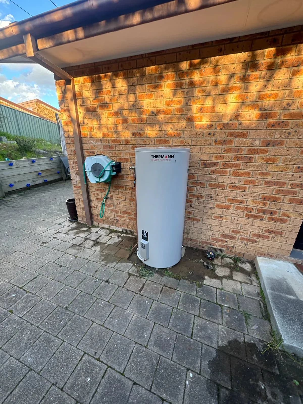 New electric hot water unit fitted outside