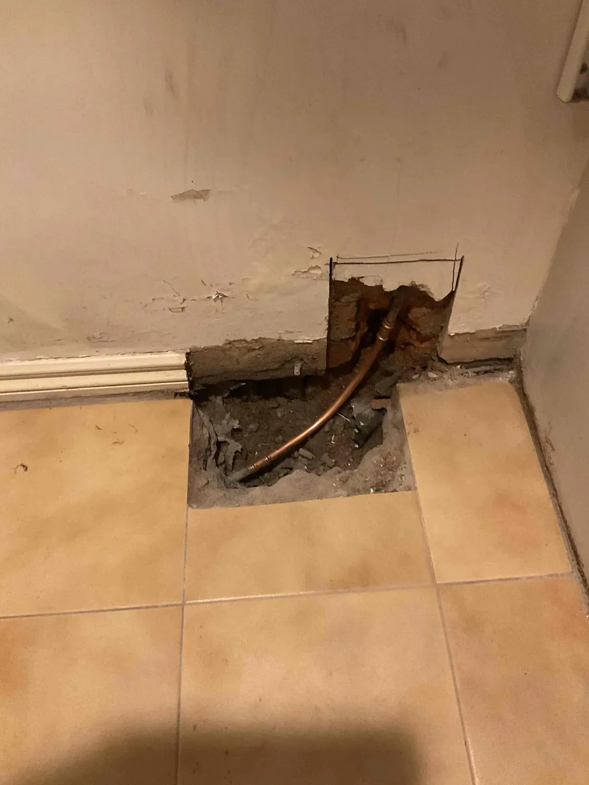 Slab opened up to reach the burst copper pipe
