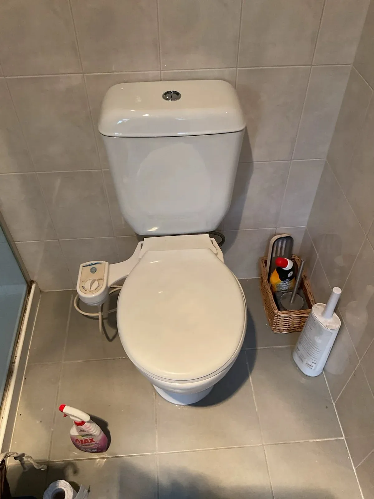 Toilet suite in a tiled bathroom