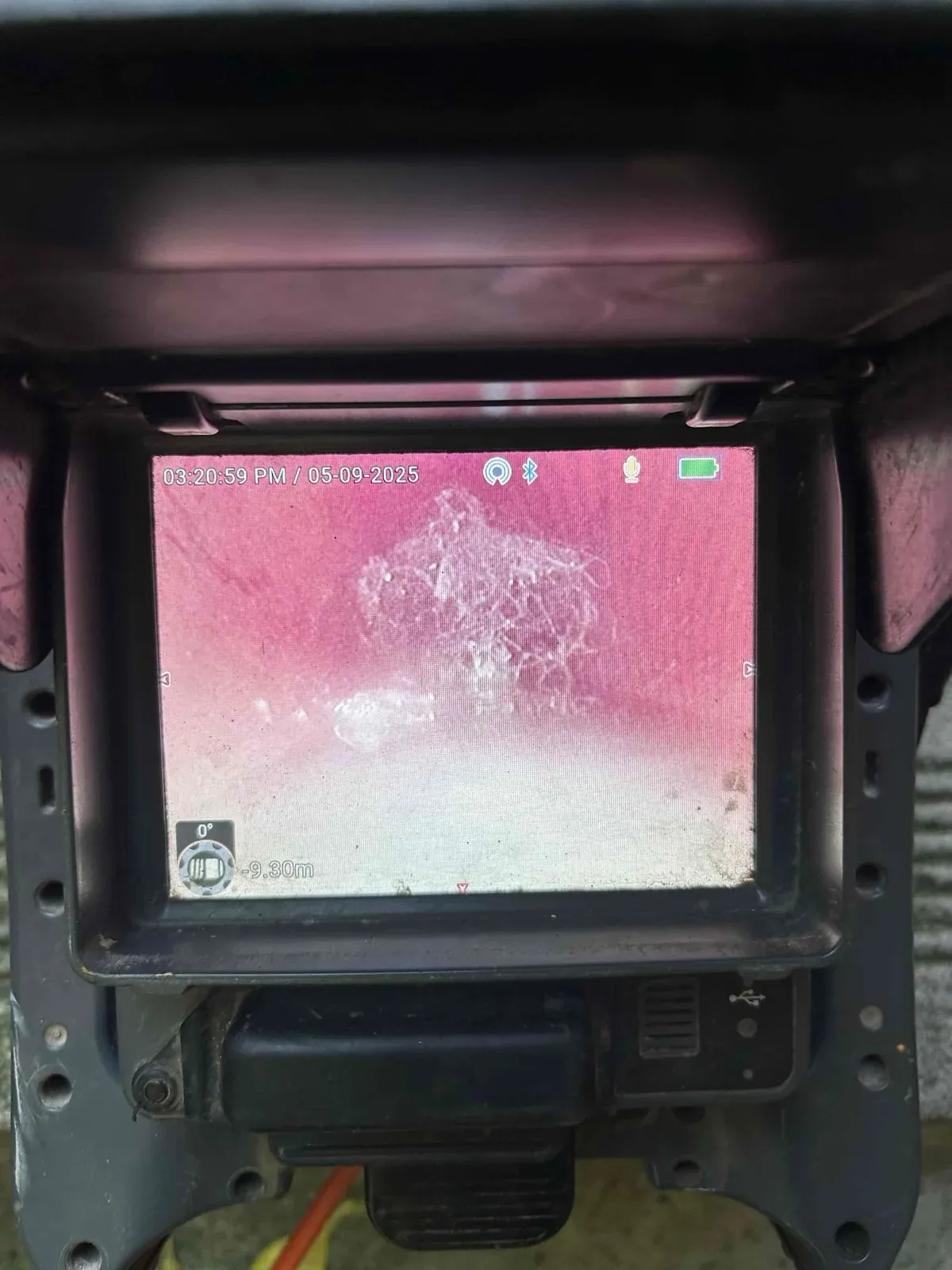 Root mass blocking the drain on camera