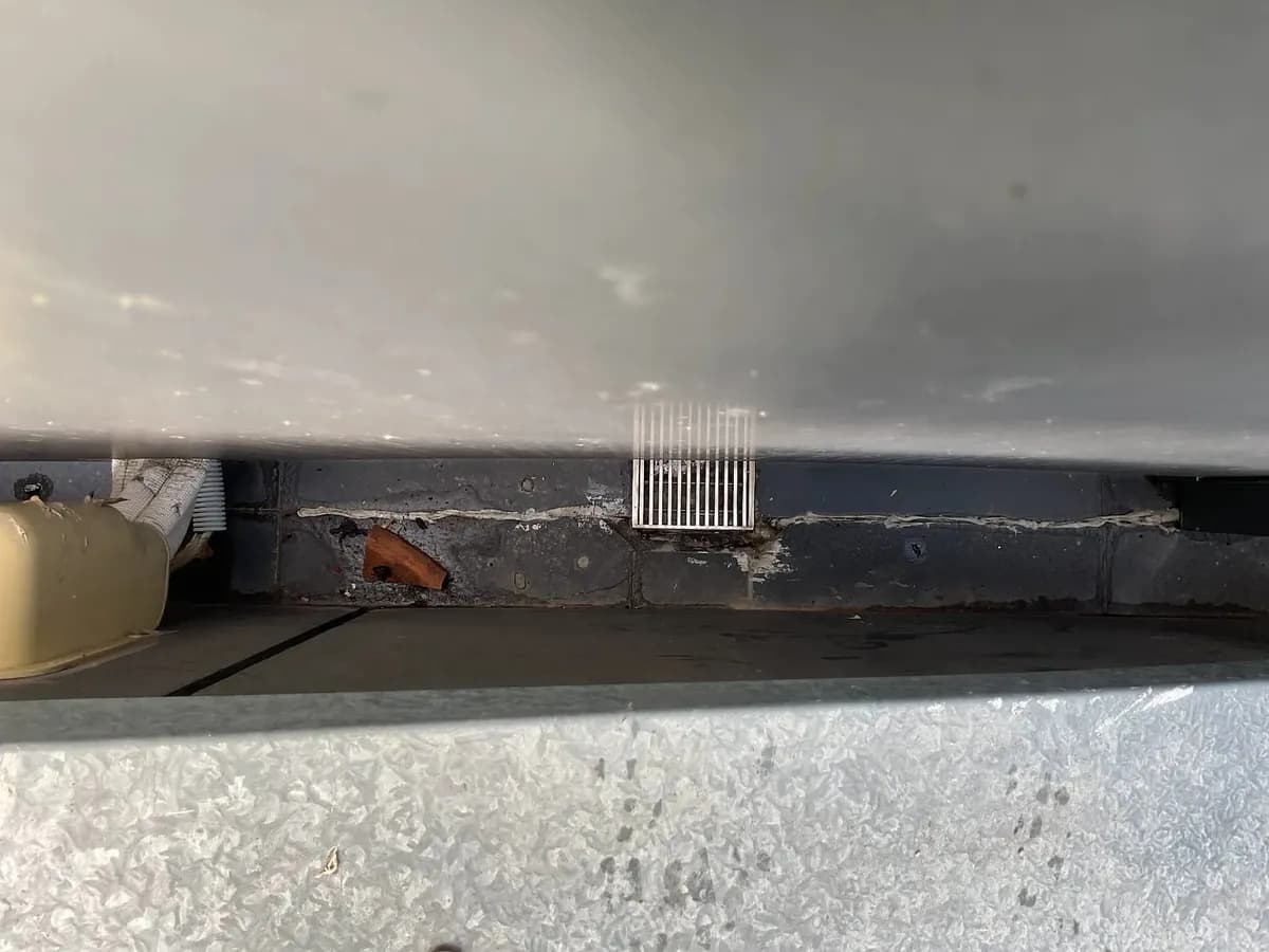 Balcony edge and drain grate being tested