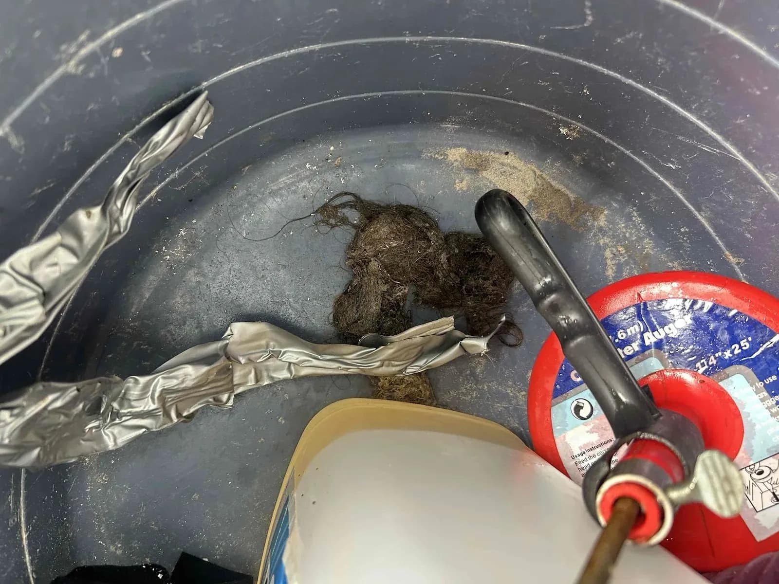 Hair and debris pulled from the blocked drain