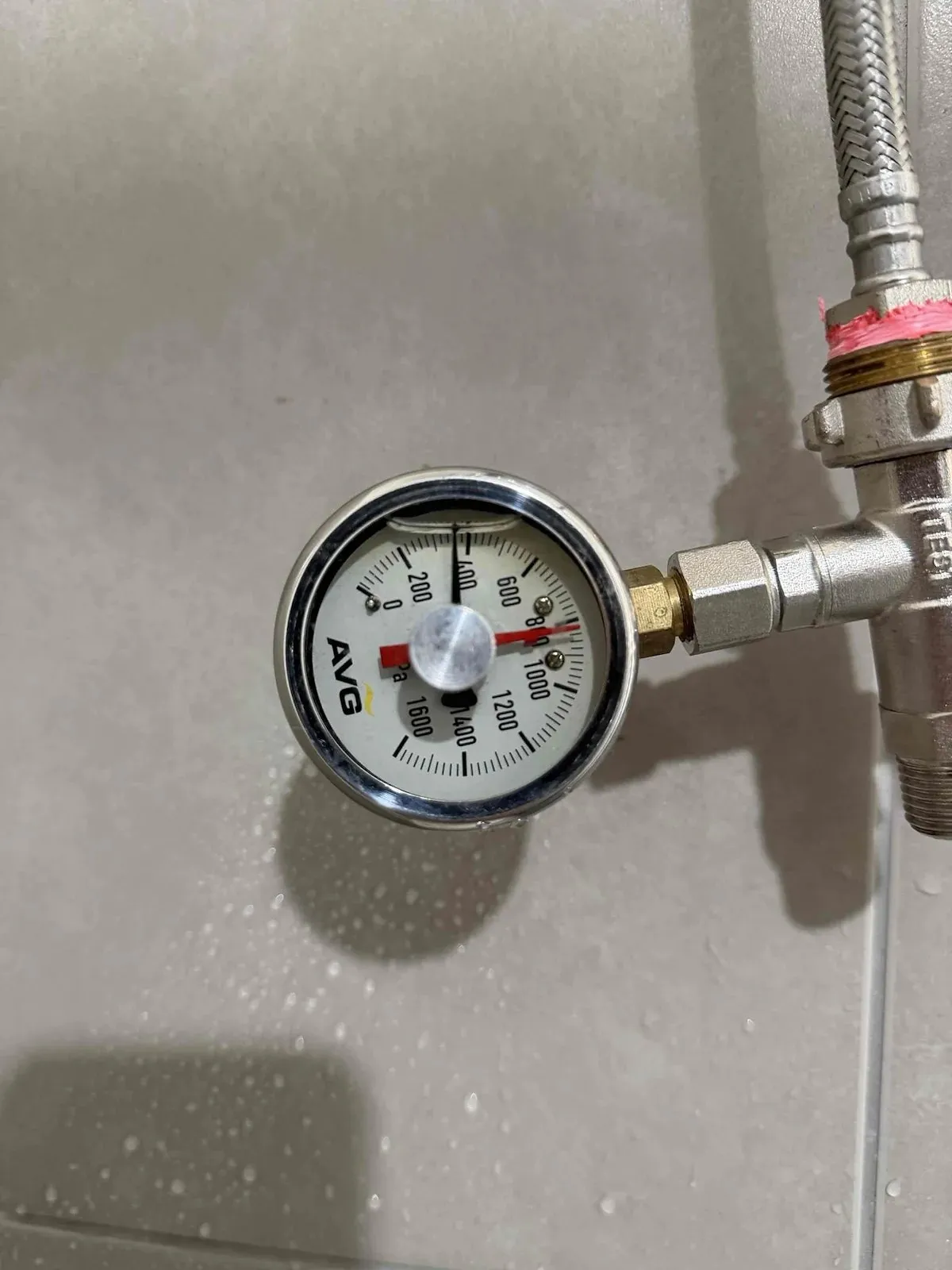 Pressure gauge fitted to the water line during leak testing