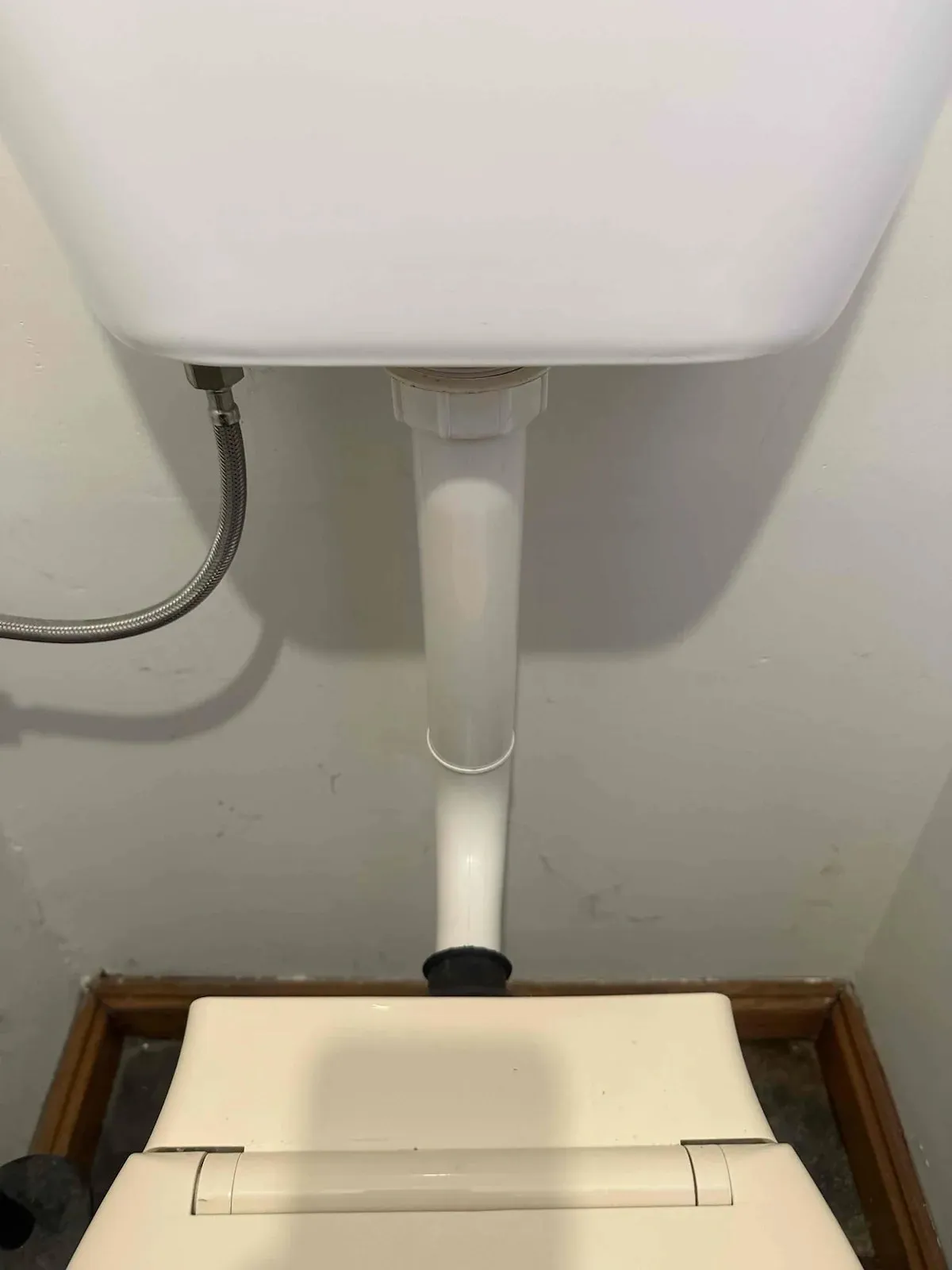 Toilet flush pipe before the repair