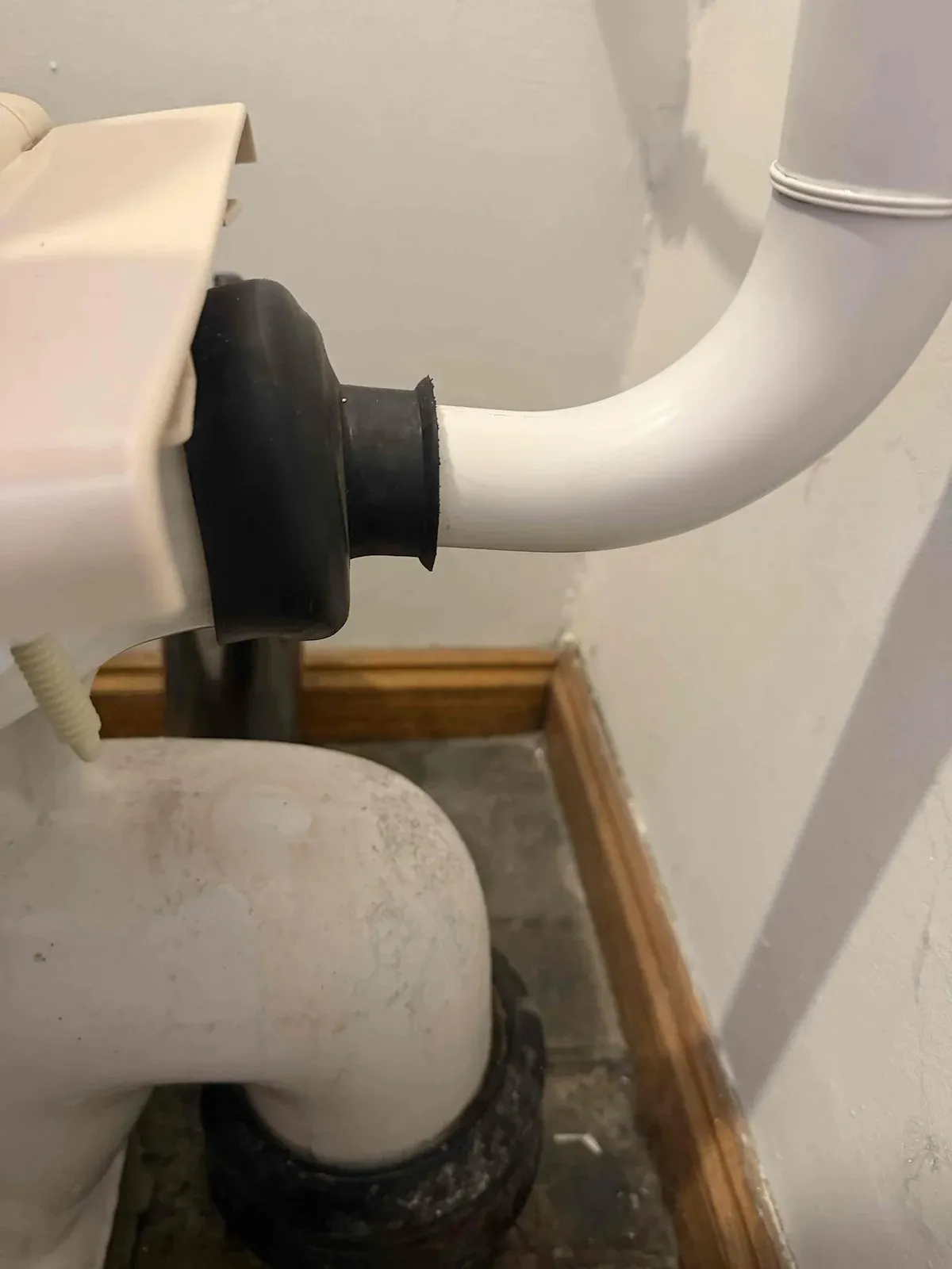 New pan connector fitted to the toilet