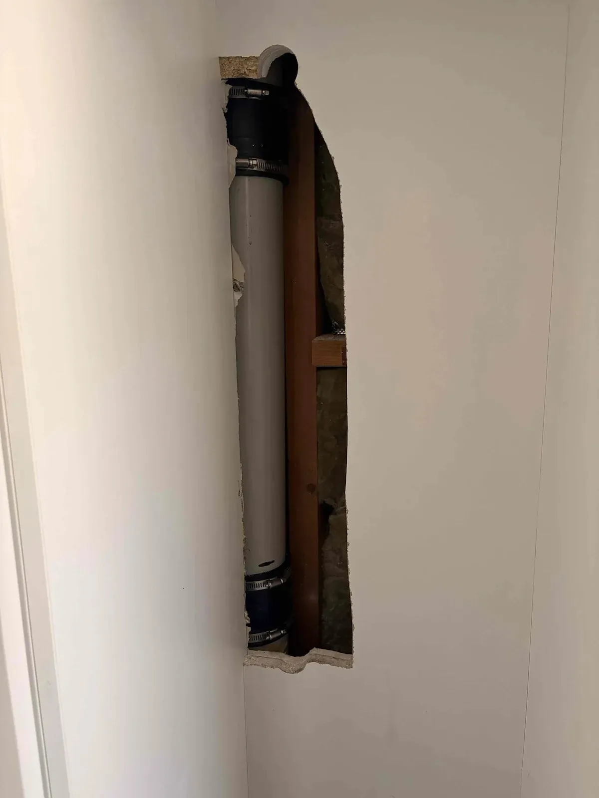 Drain pipe exposed in the wall cavity