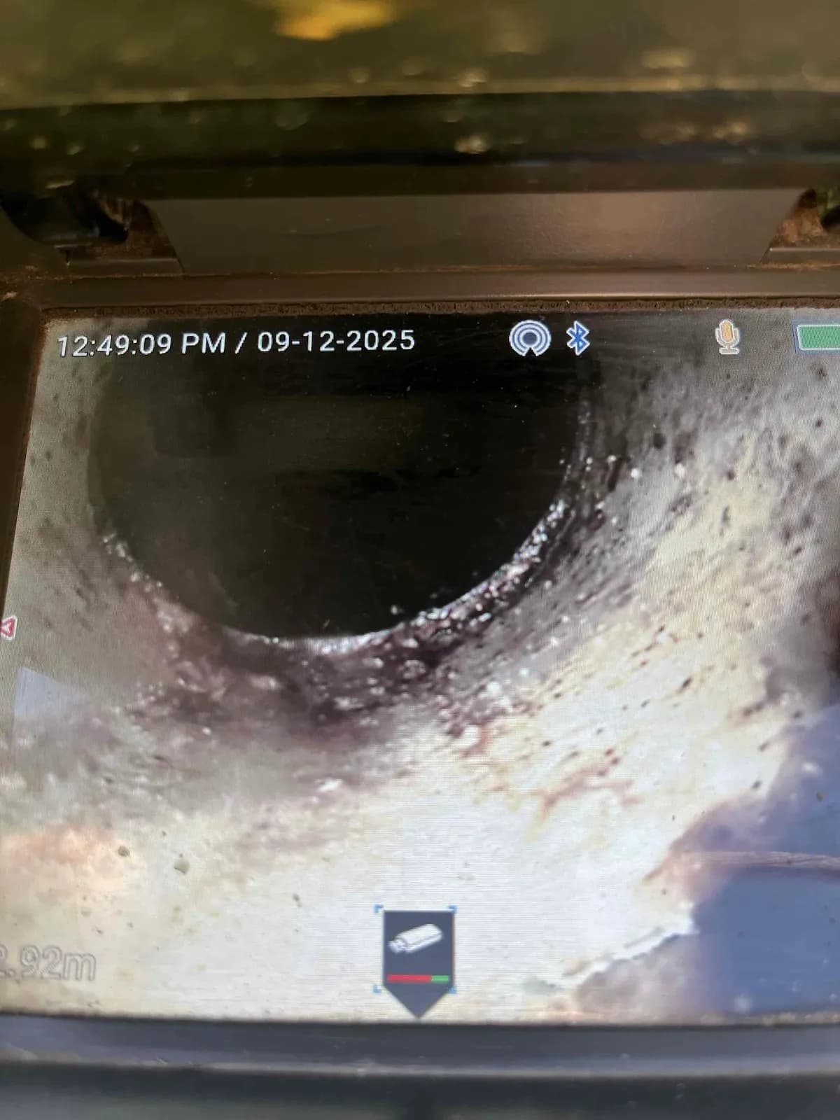 Drain camera showing the sewer pipe clear after cleaning