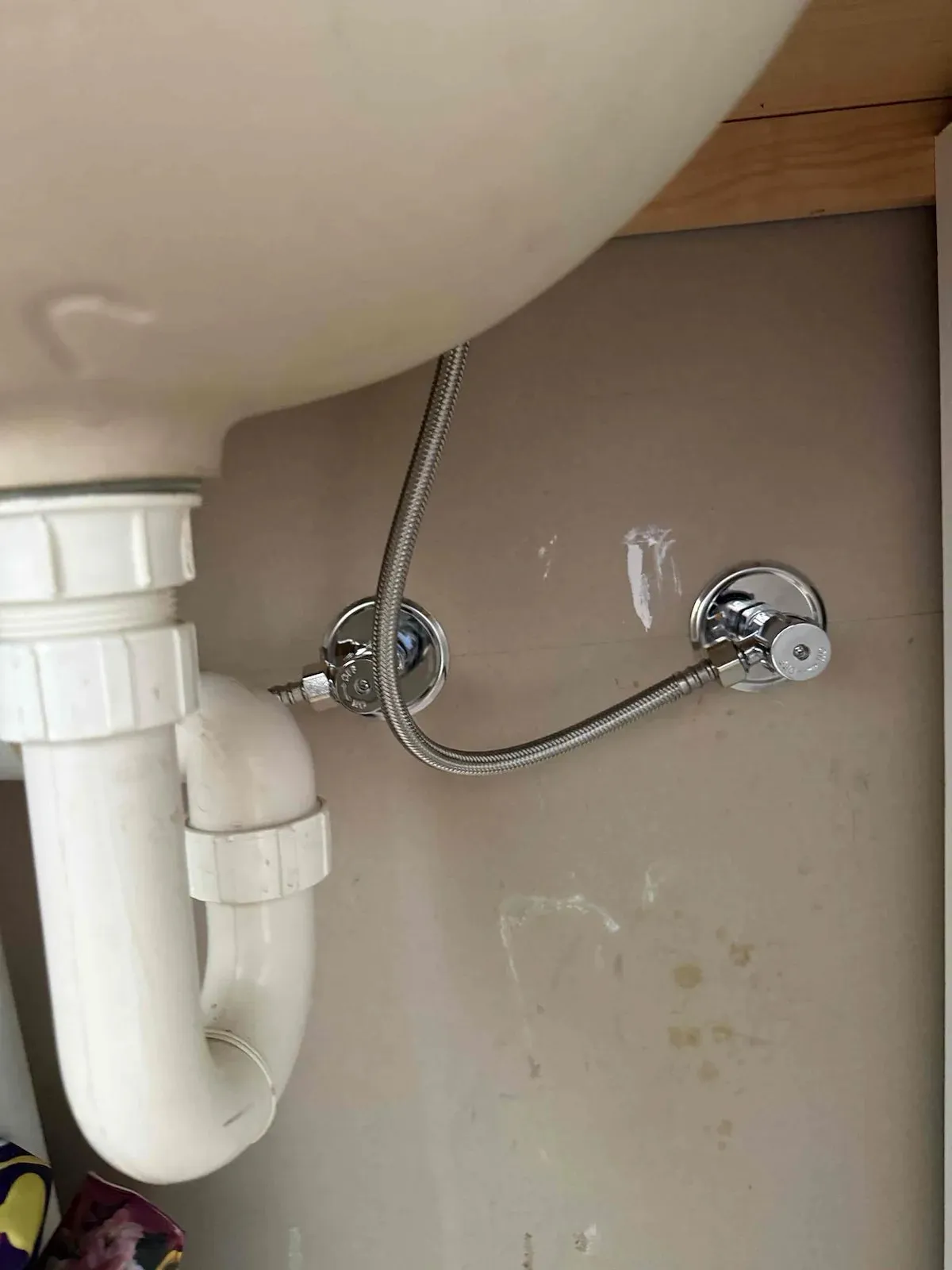 New isolation valve and flexible hose under a basin