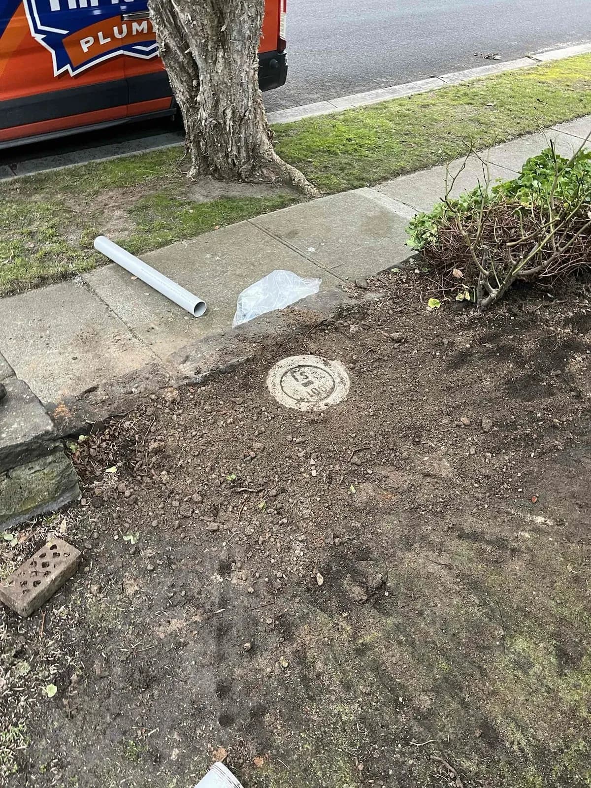 Inspection shaft dug up and repaired in the front yard
