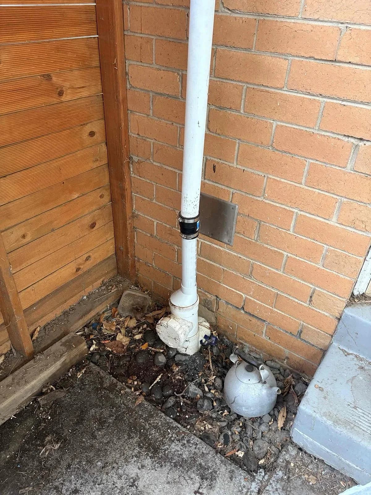 Sewer access point beside the house