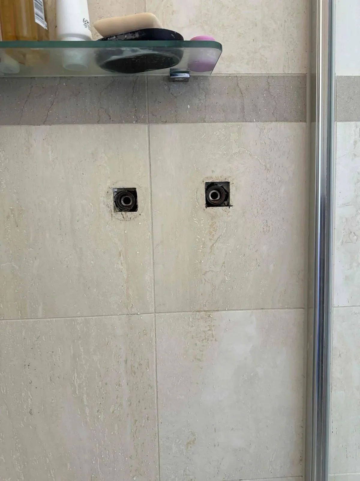 Shower taps opened up for re-washering