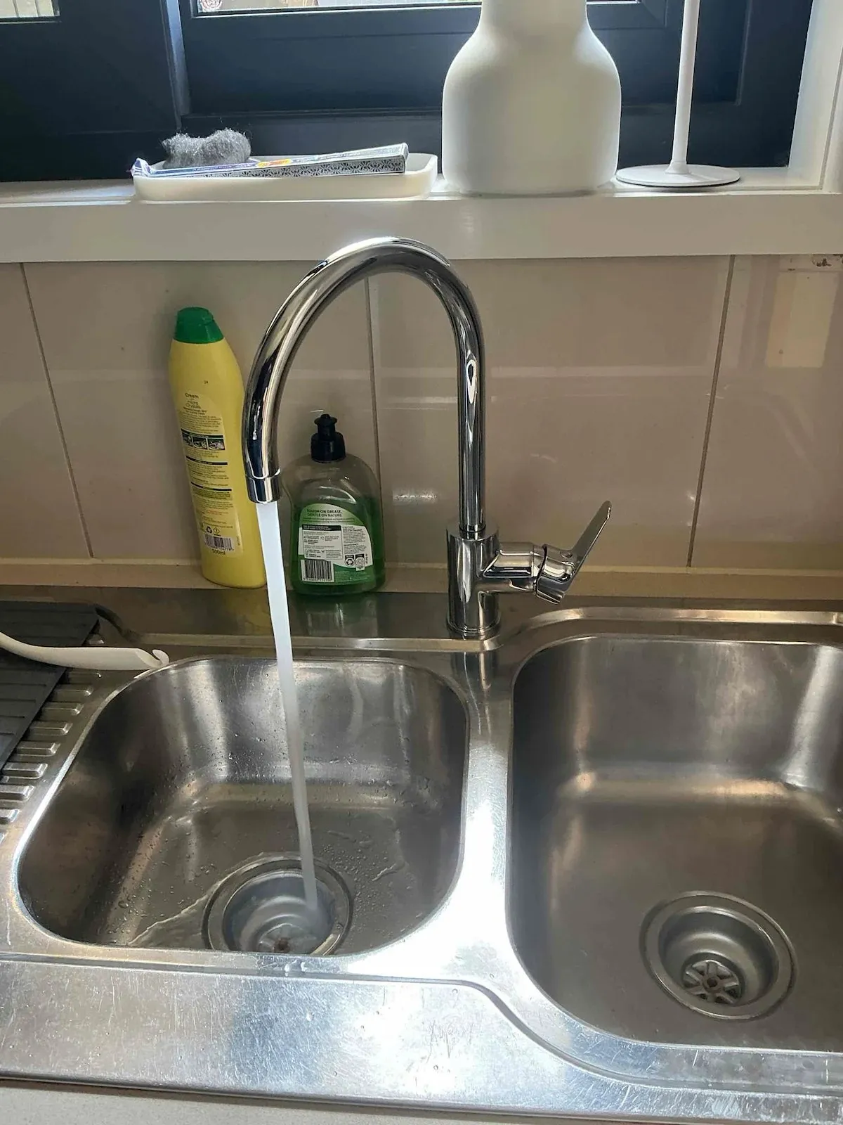 New gooseneck mixer on the kitchen sink