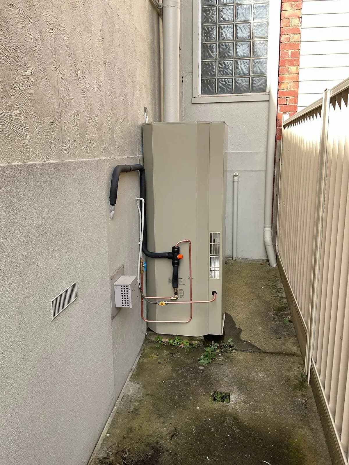 New gas hot water system installed down the side of the house