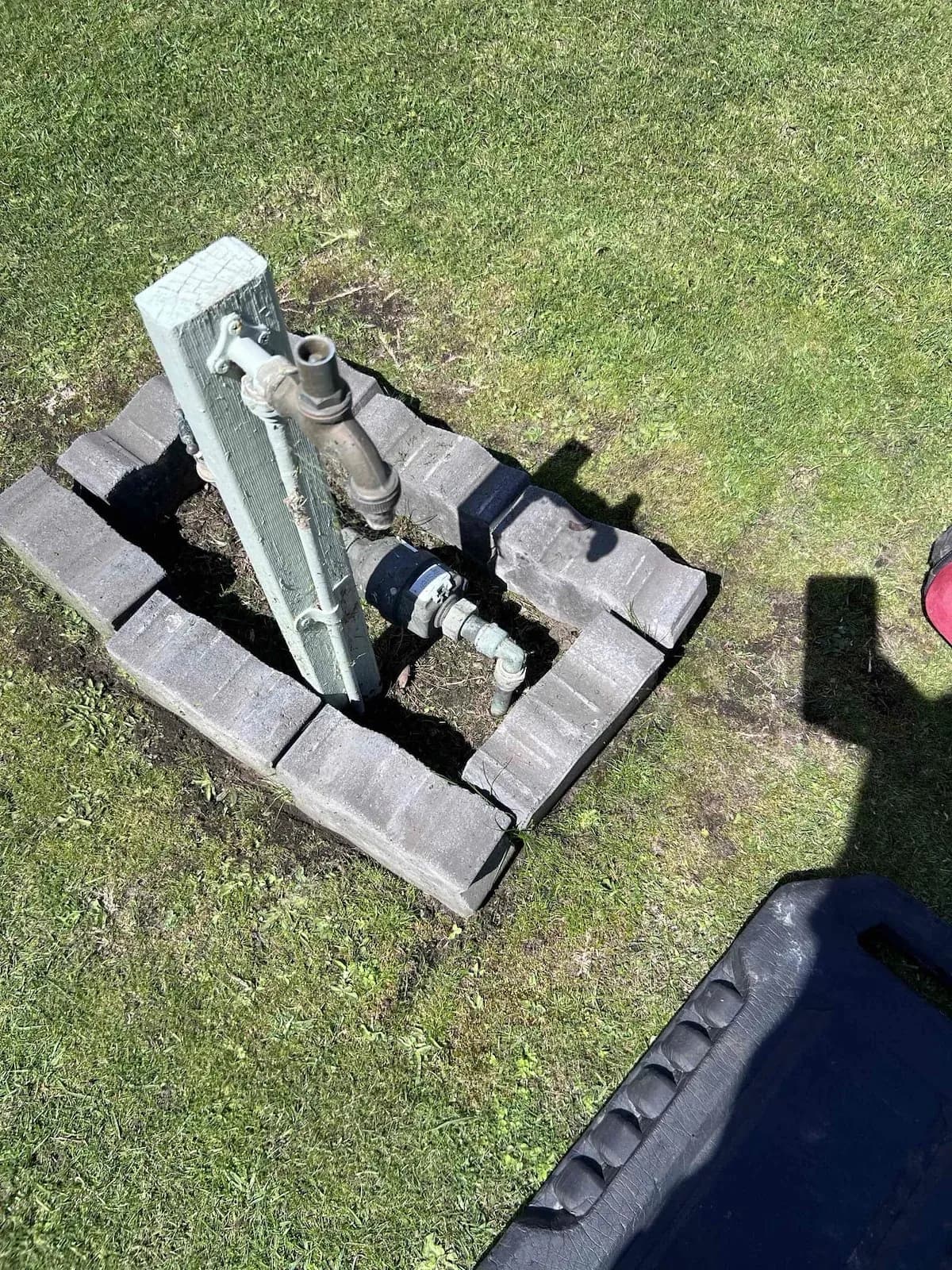 Water meter with a new pressure regulator and valves on the front lawn
