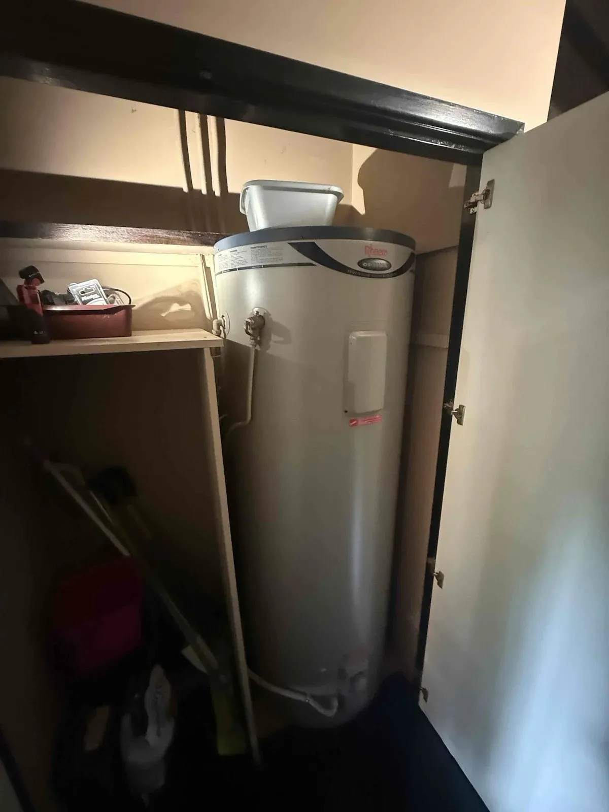 New electric hot water unit in the laundry cupboard