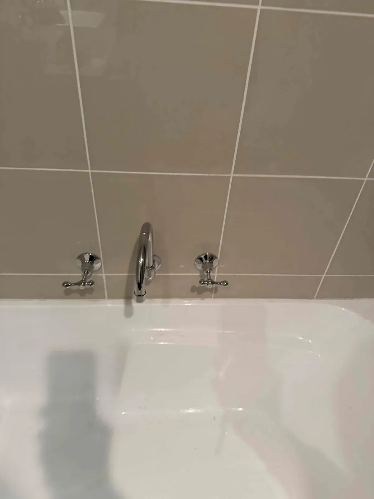 New bath spout and lever taps
