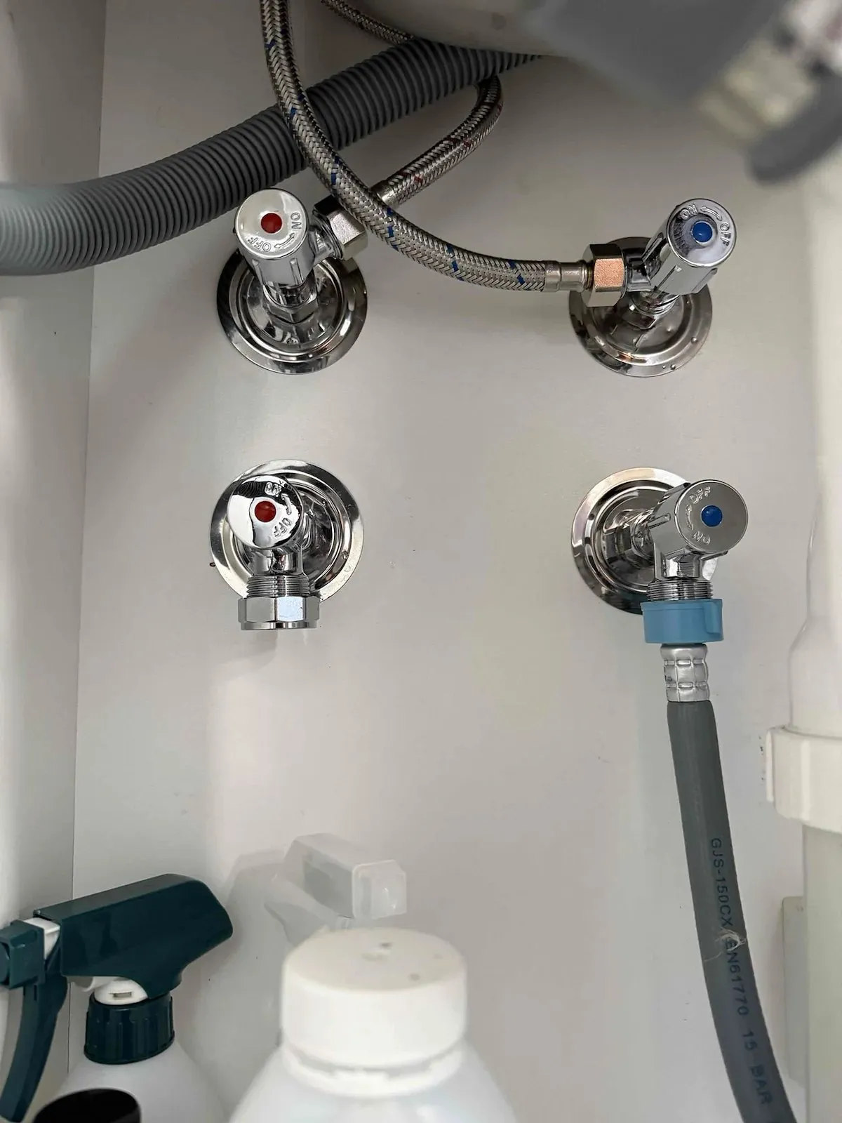 New isolation valves under the laundry sink