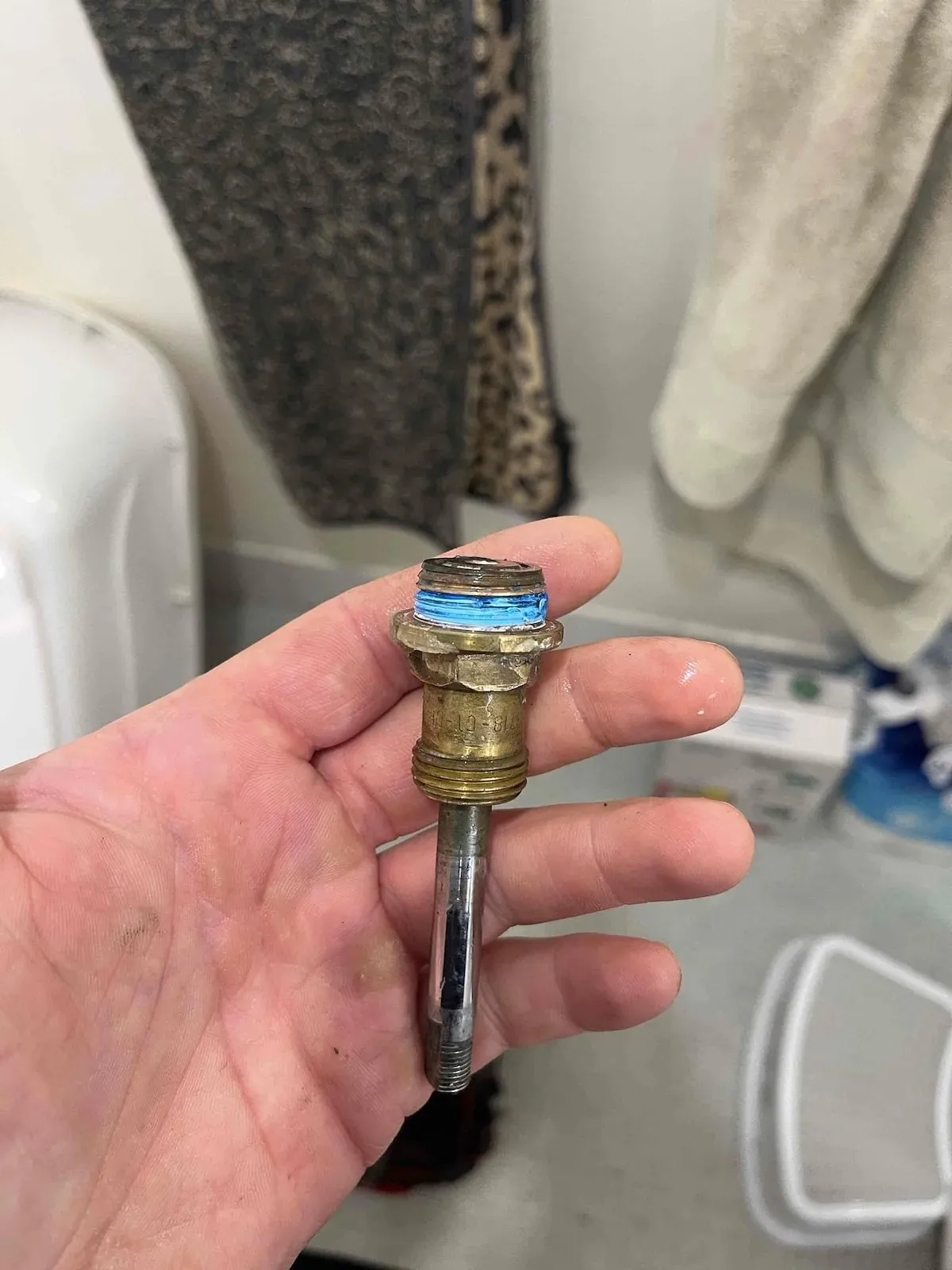 Shower tap spindle removed for overhaul