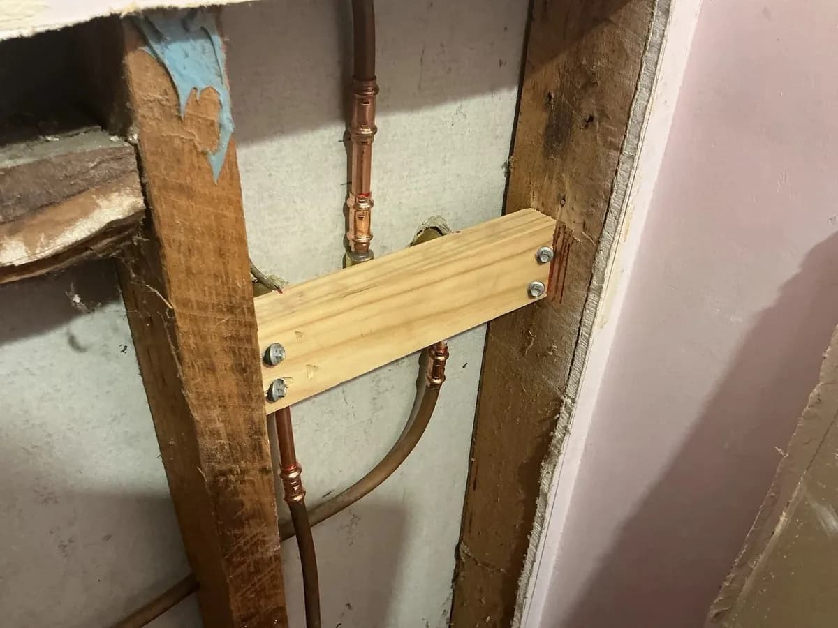 New breach secured to a new timber noggin