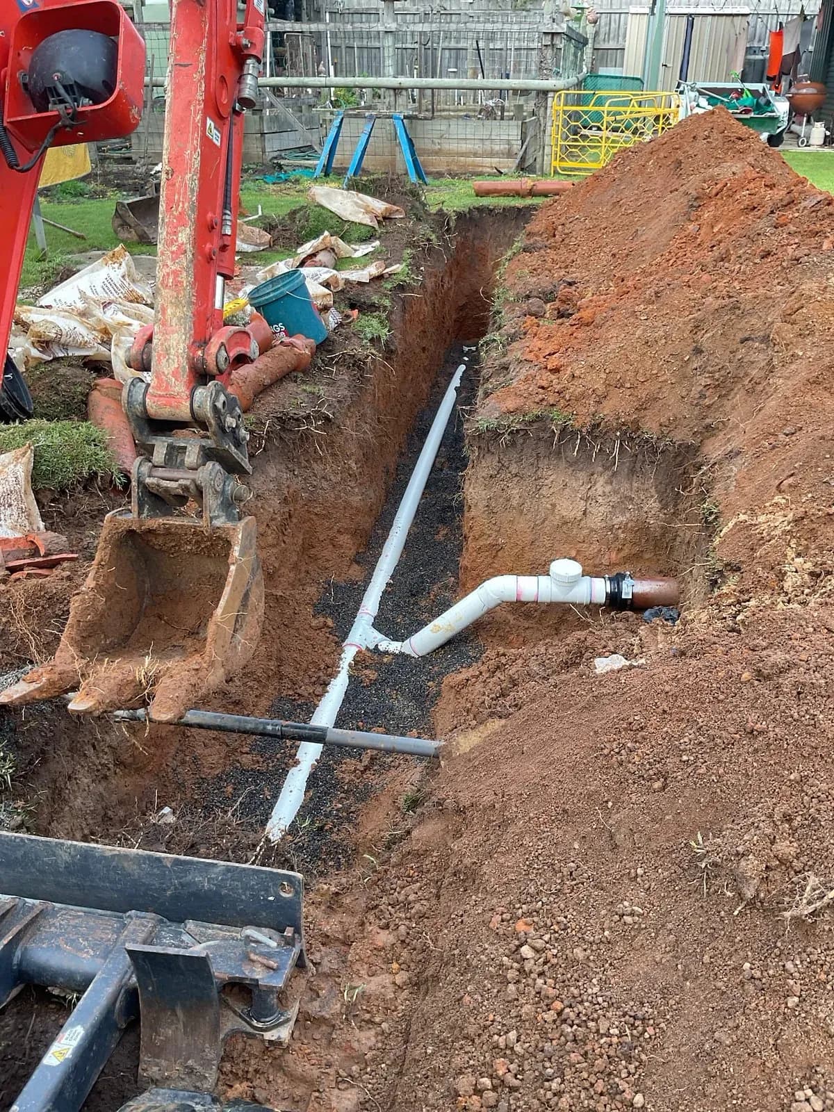 Excavating to replace a broken sewer section in Mornington