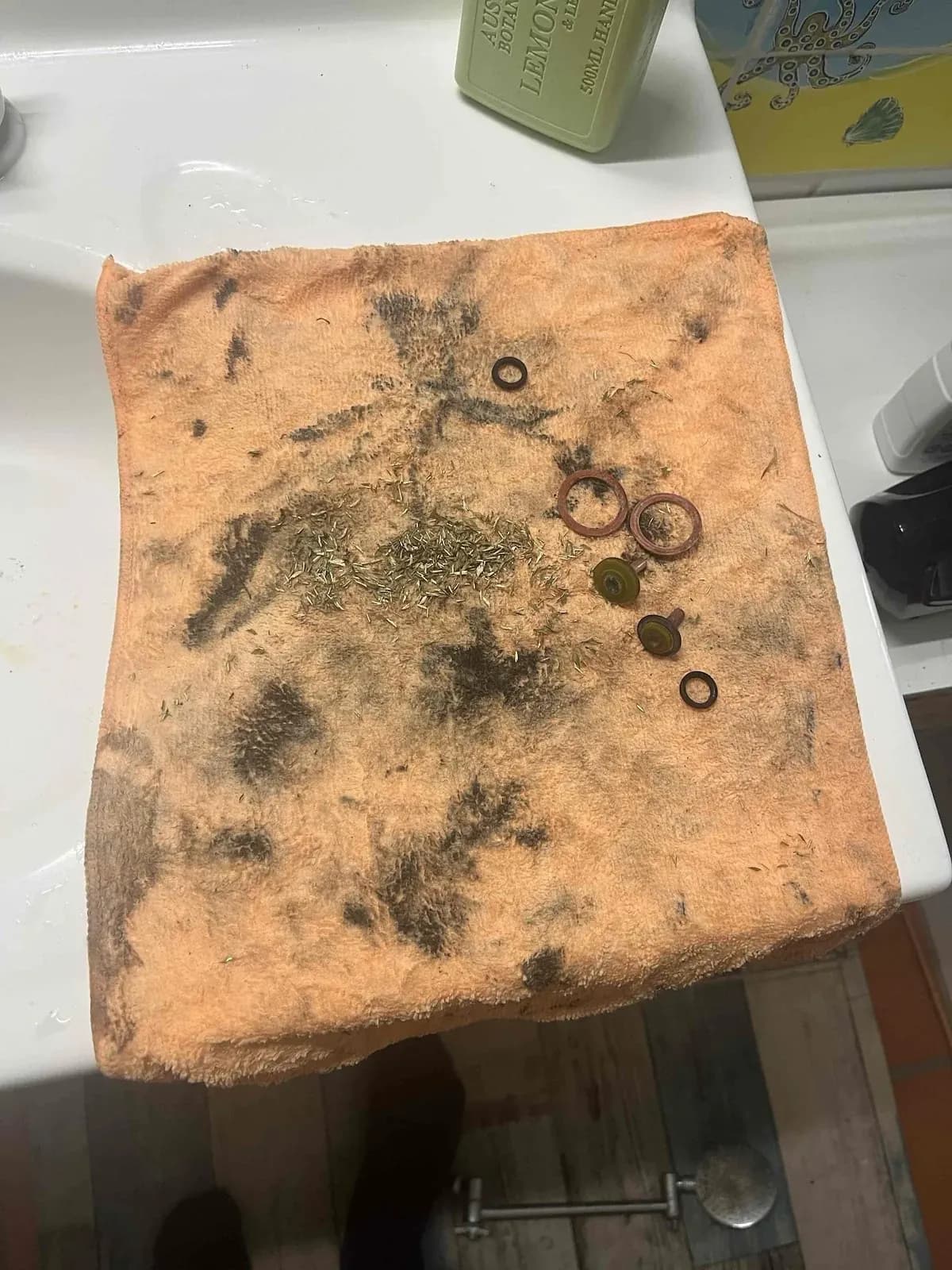 Worn washers and seals taken out of the shower taps