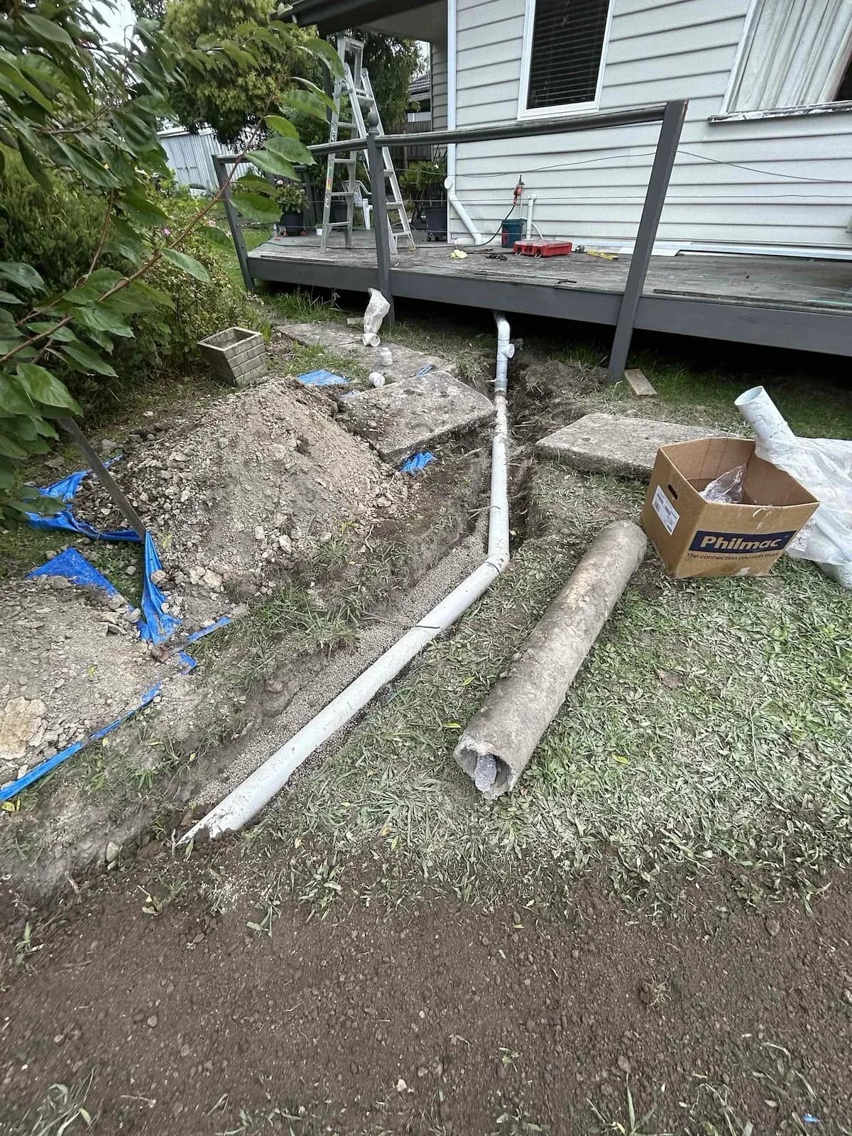 New PVC stormwater line next to the old clay pipe it replaced