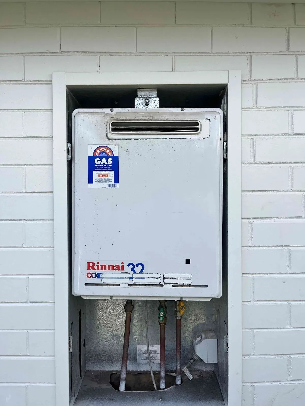 New continuous flow gas hot water unit in its recess box