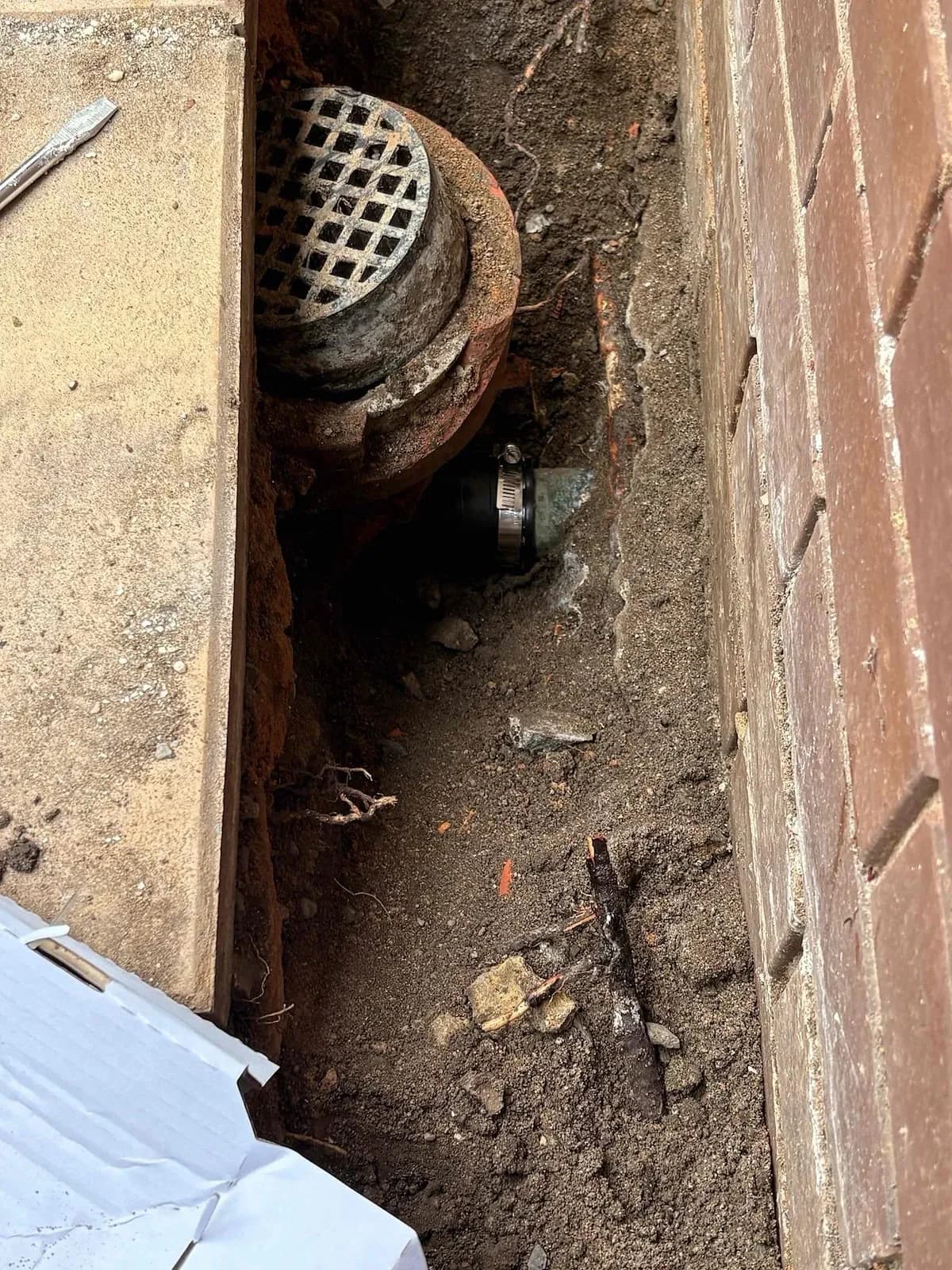 Exposed drain pipe beside the house in Mount Waverley