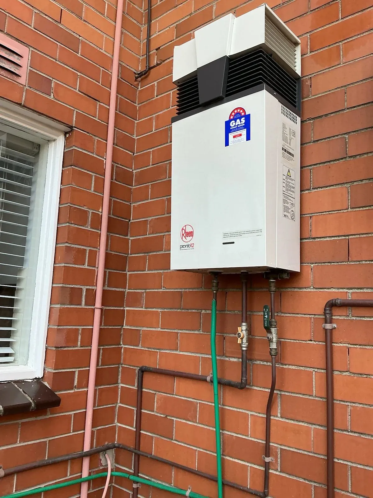 New gas hot water unit on the wall