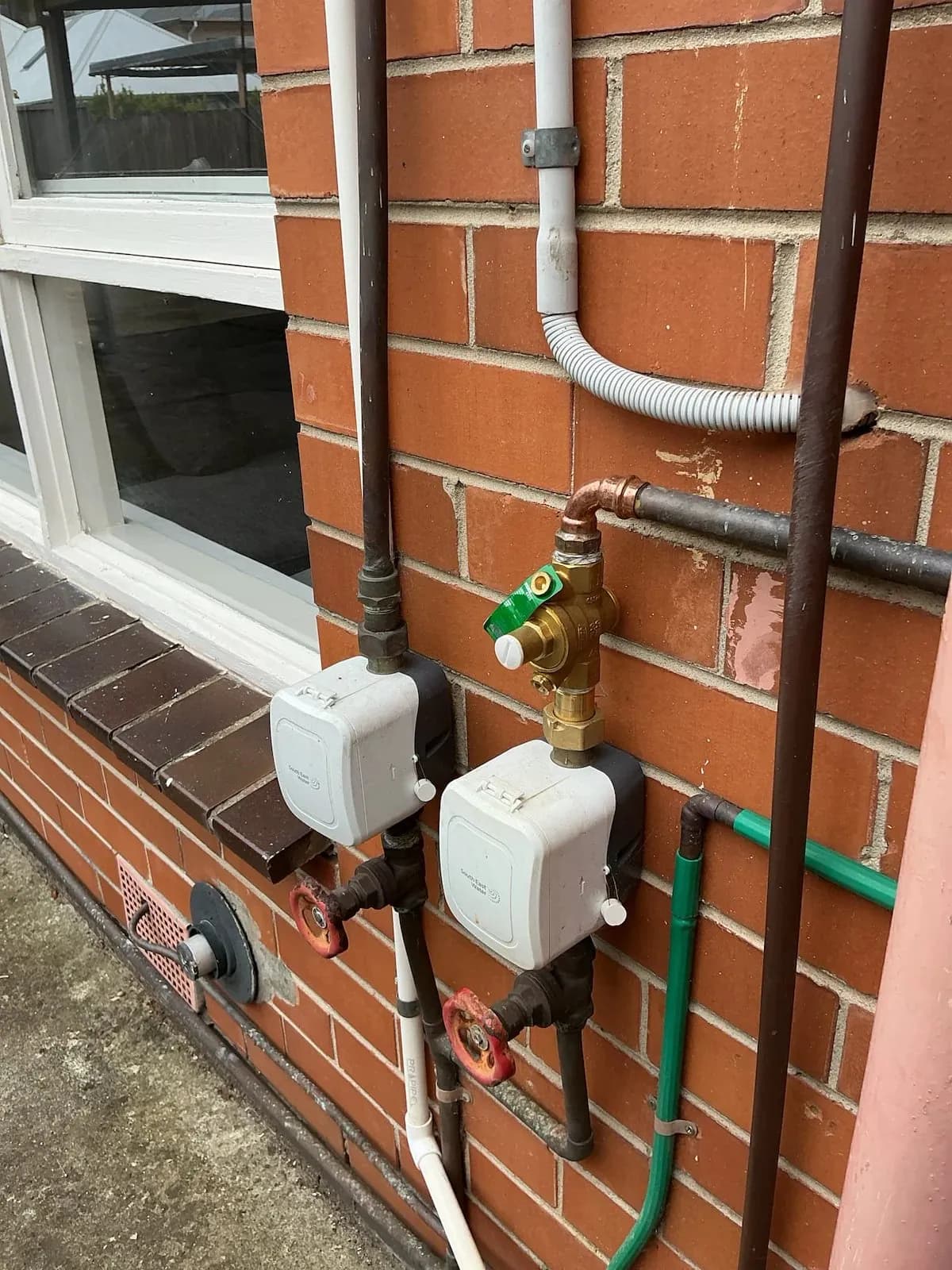 Valves and connections at the hot water unit