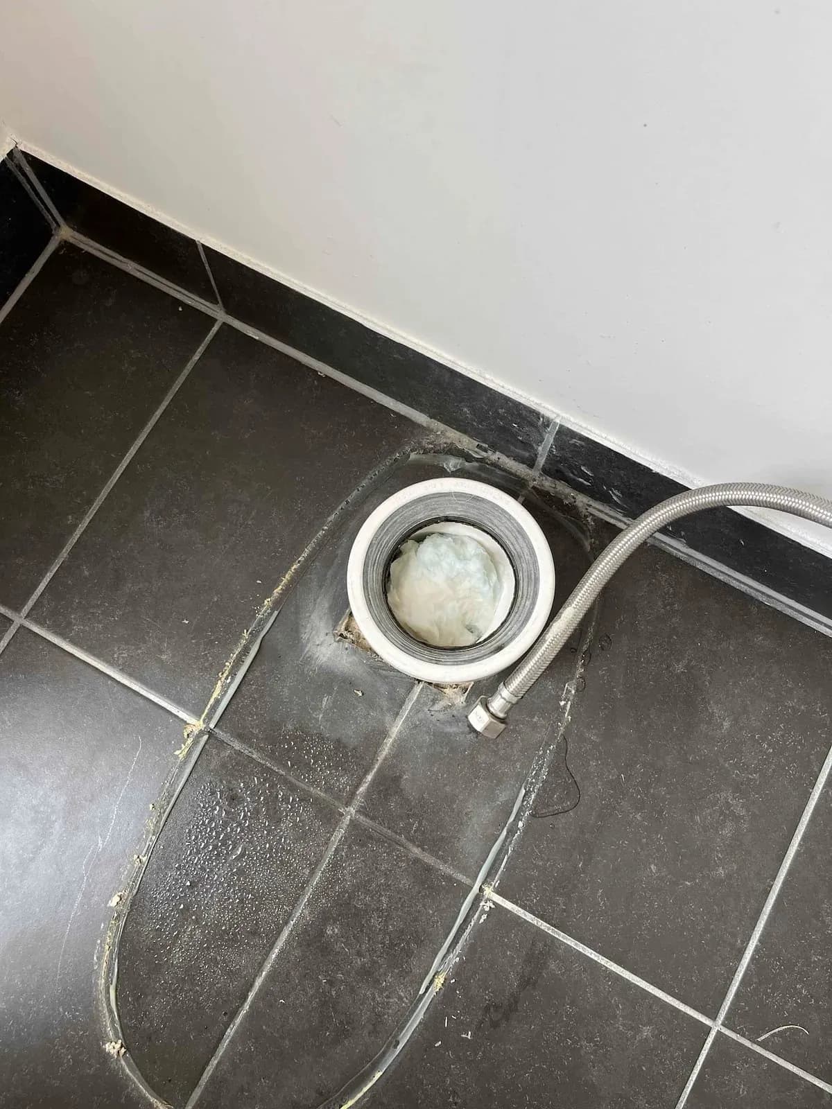 Toilet removed to clear the blocked drain