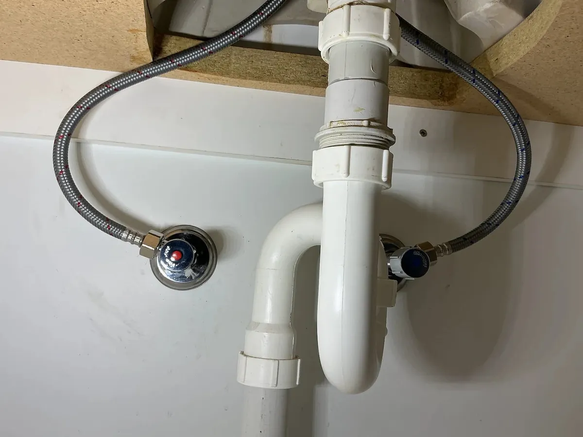 New isolation taps and hoses under the basin