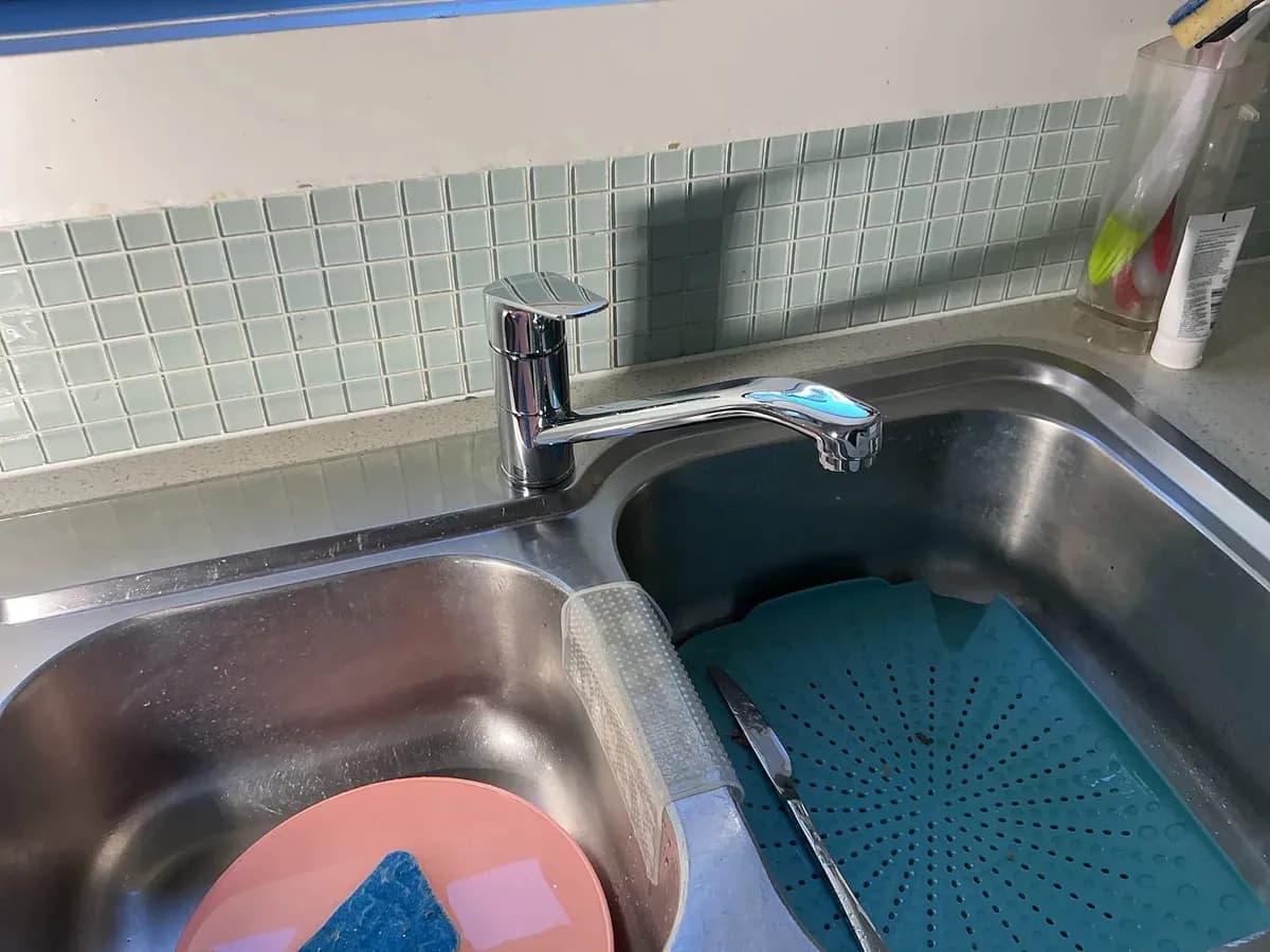 New kitchen mixer tap on the sink