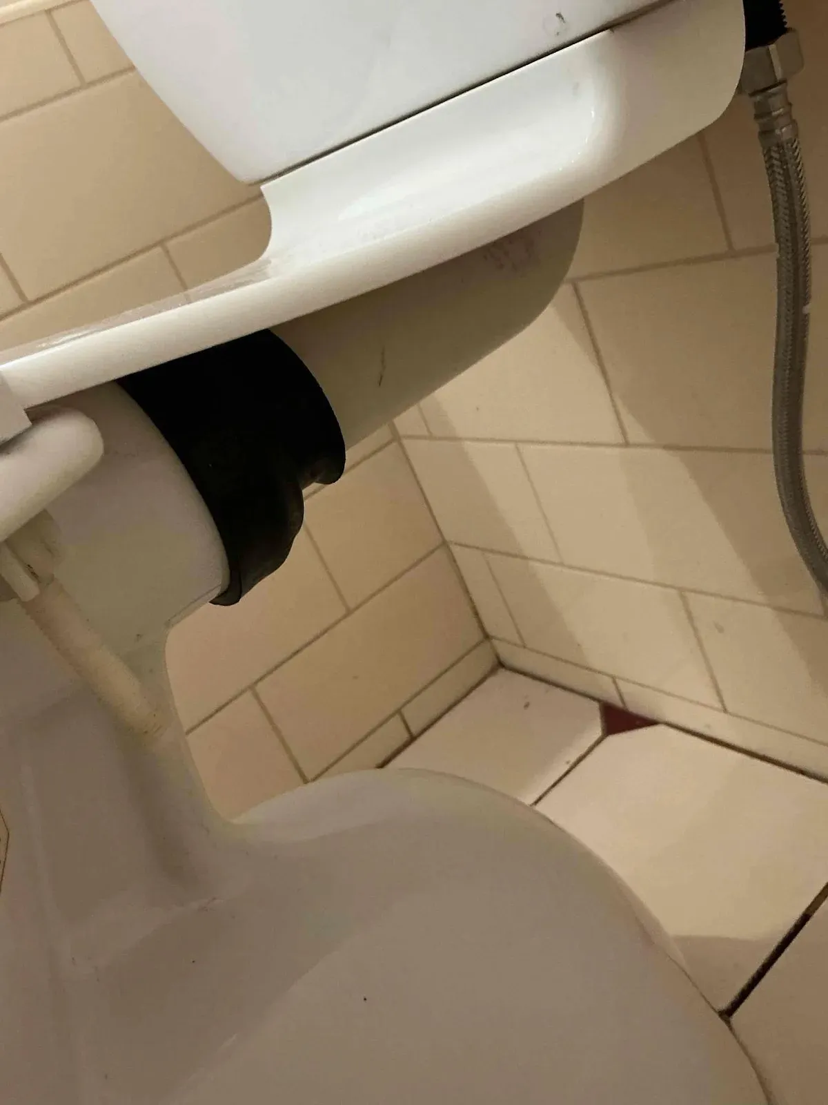 Ensuite toilet lifted to jet a root-blocked sewer in Point Cook