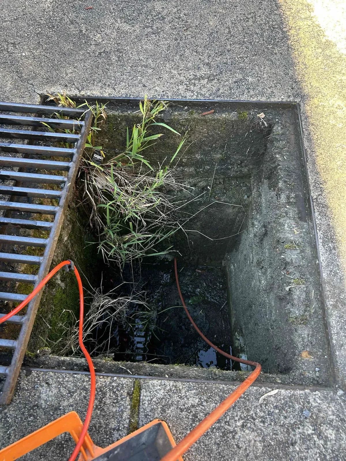 Stormwater pit opened up for clearing