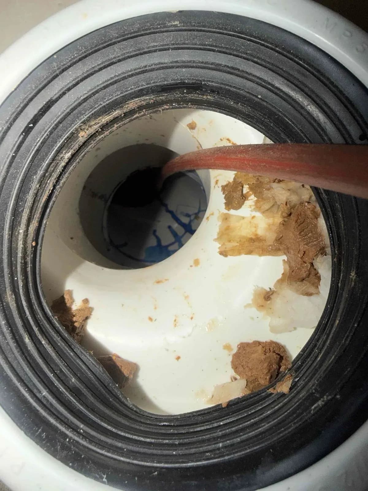 Toilet pan collar removed, showing the offset causing blockages