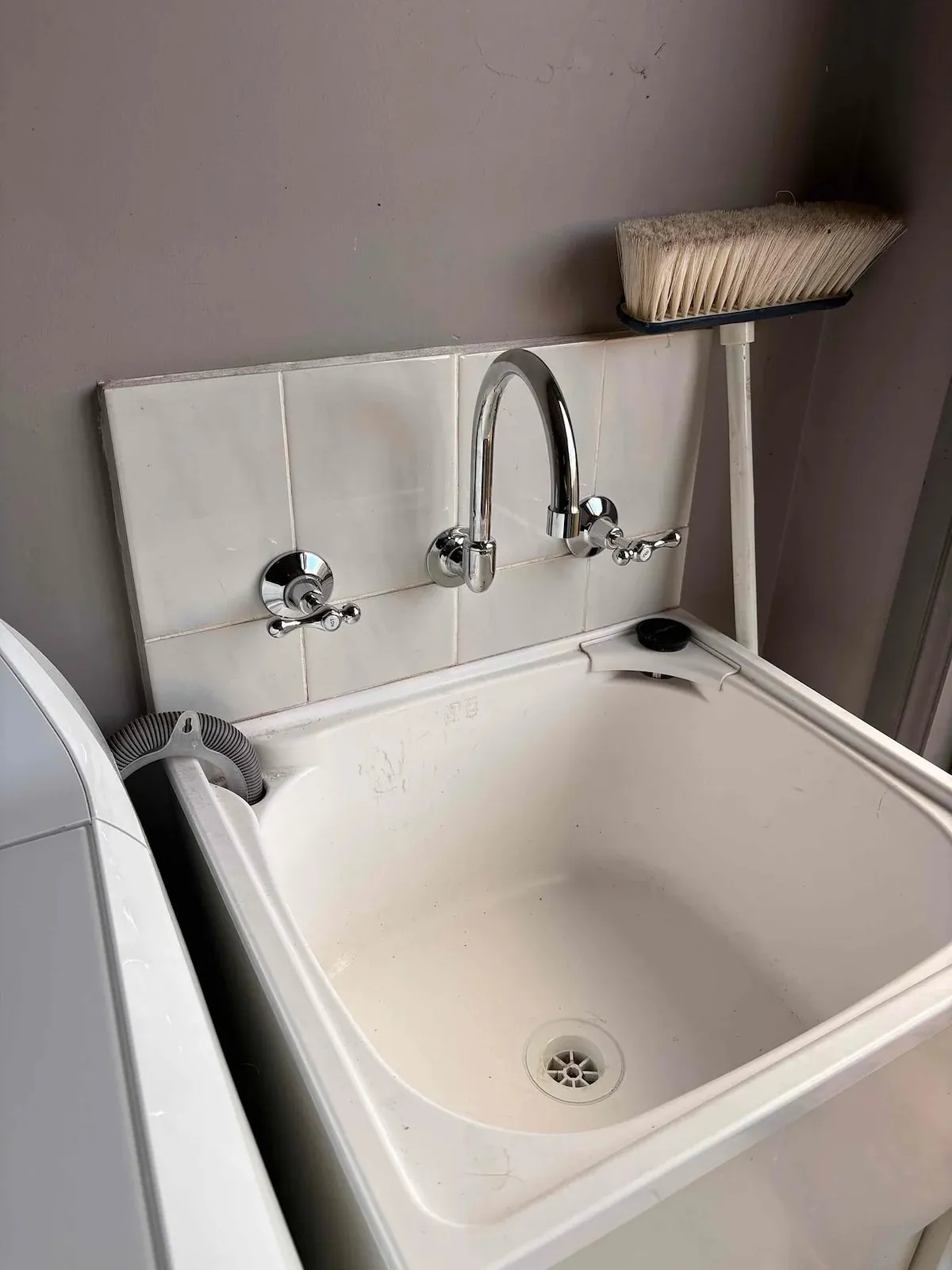 Laundry trough with wall taps