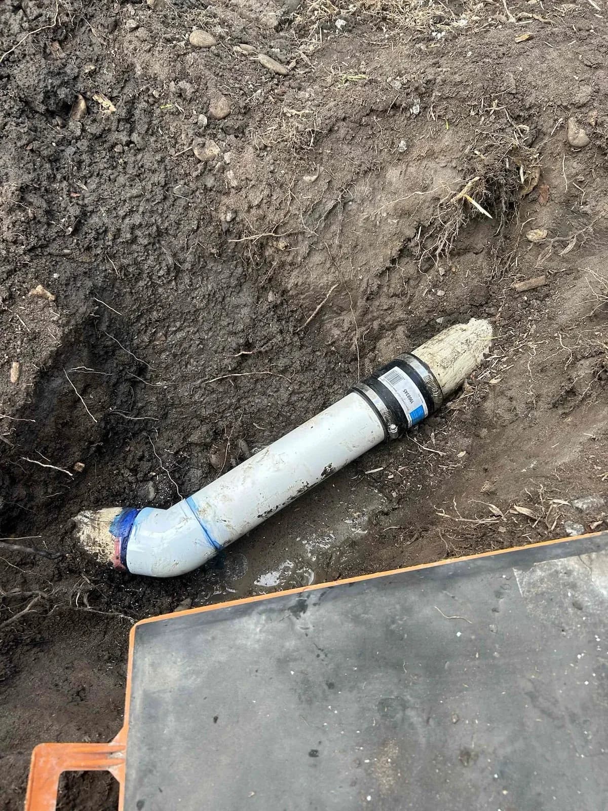 New PVC drain section joined in