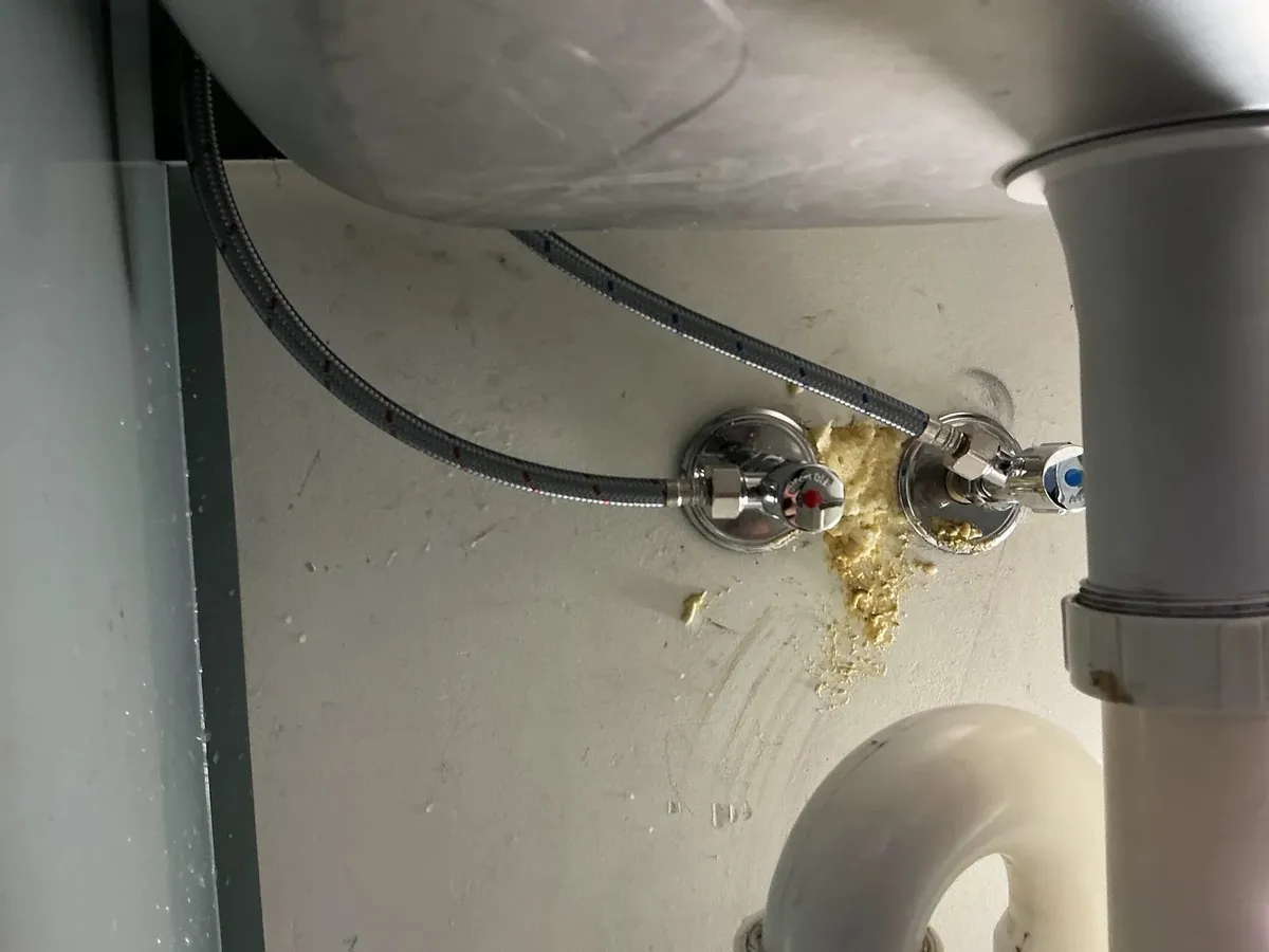 Old laundry taps with corroded connections